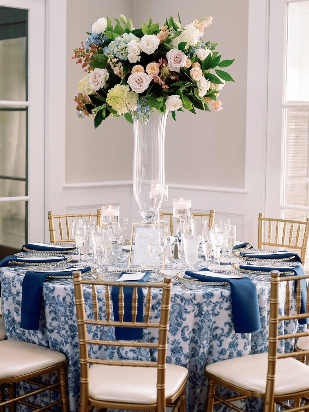 B + P had the kind of floral palette that completely changed the feeling of the room. Soft peaches, layered blushes, blue-and-white details, and texture on texture. Their day was designed to feel like an elevated, European-inspired romance, and this 