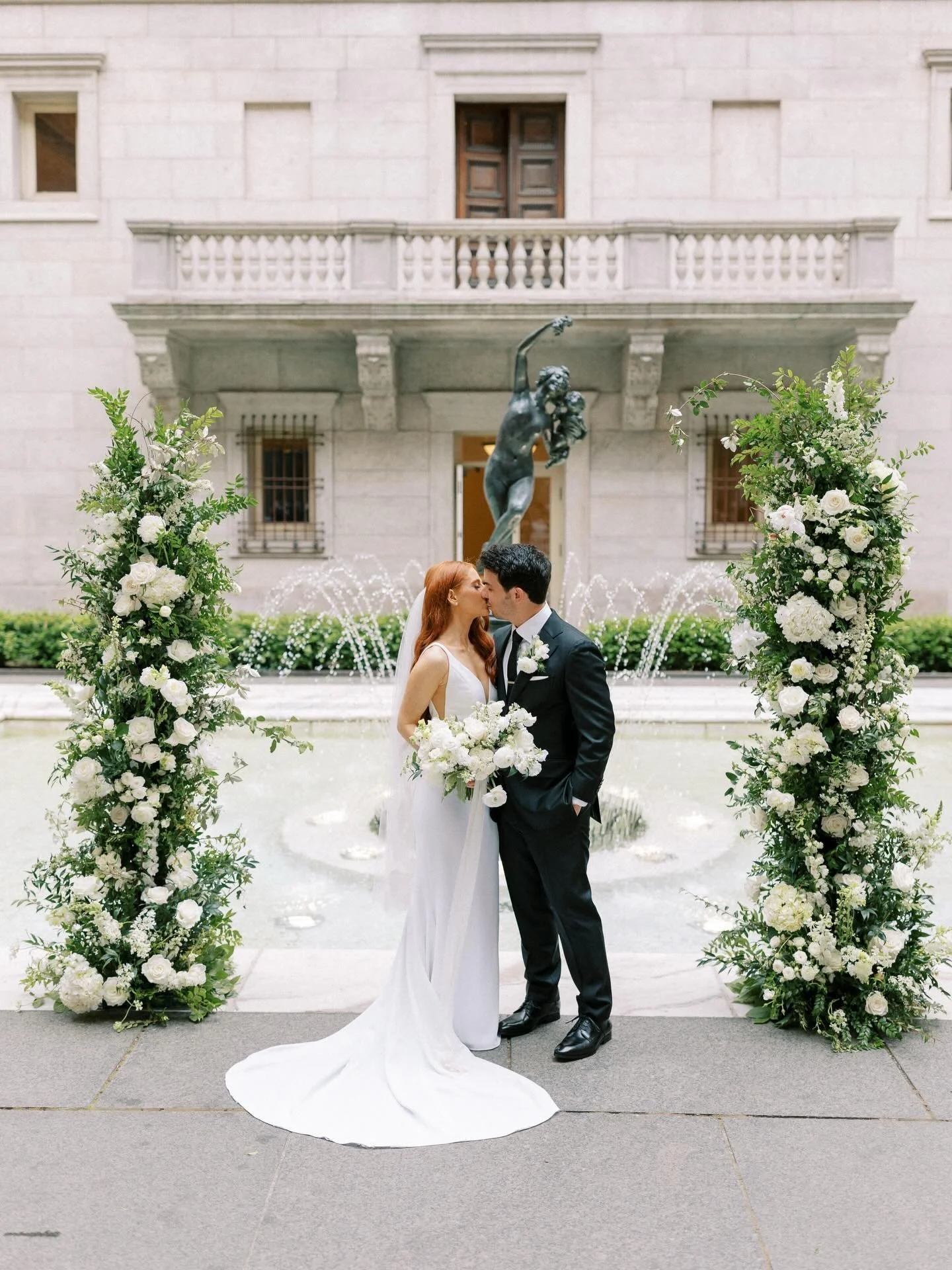 A venue that speaks for itself 😍 An elevated palette of classic whites, layered greens, and candlelight set against the timeless architecture of the Boston Public Library made for the most perfect day for B + M.

Photography: @haliechildphoto 
Venue