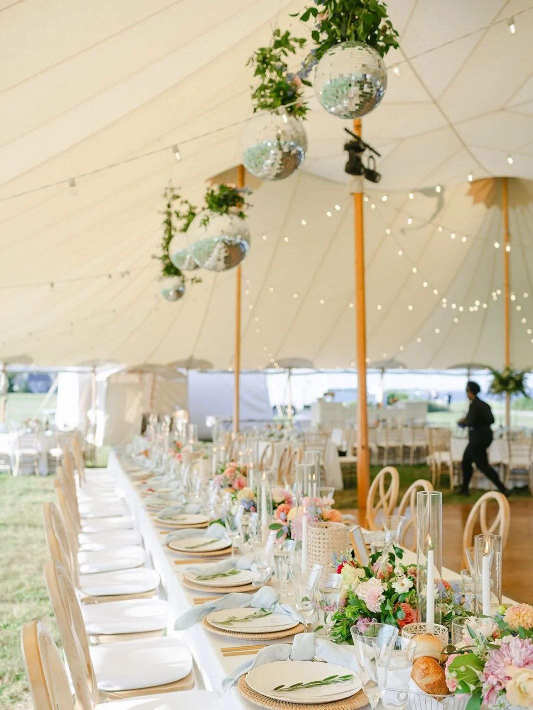 Soft color, lush greens, warm candlelight, and a little disco magic! A+Z&rsquo;s day was romantic, playful, and everything we love about a tented summer wedding.

Planning + Design: @jessicahennesseyweddings 
Photography: @deborahzoe