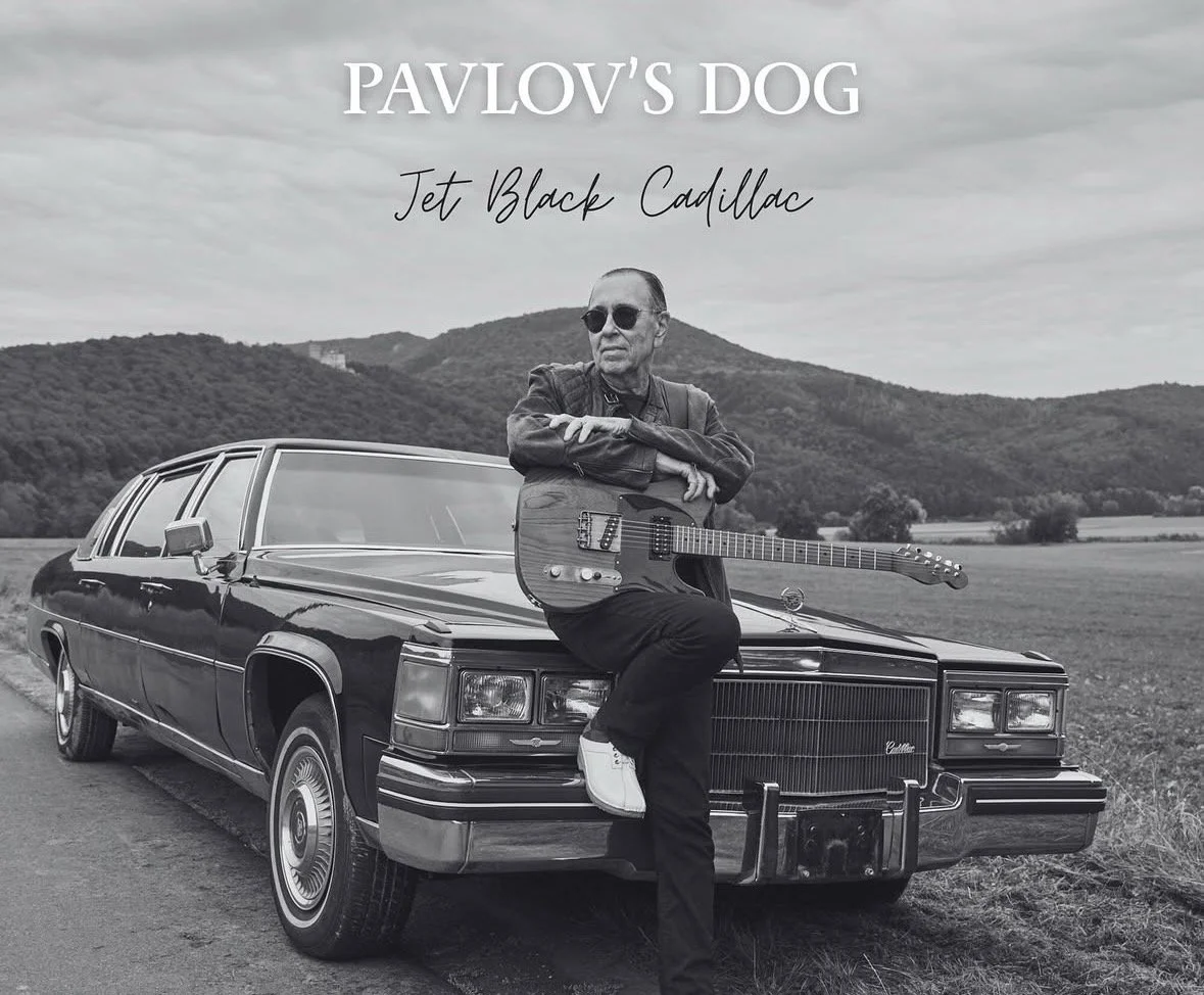 Pavlov’s Dog Jet Black Cadillac artwork featuring David Surkamp with a guitar beside a Cadillac.