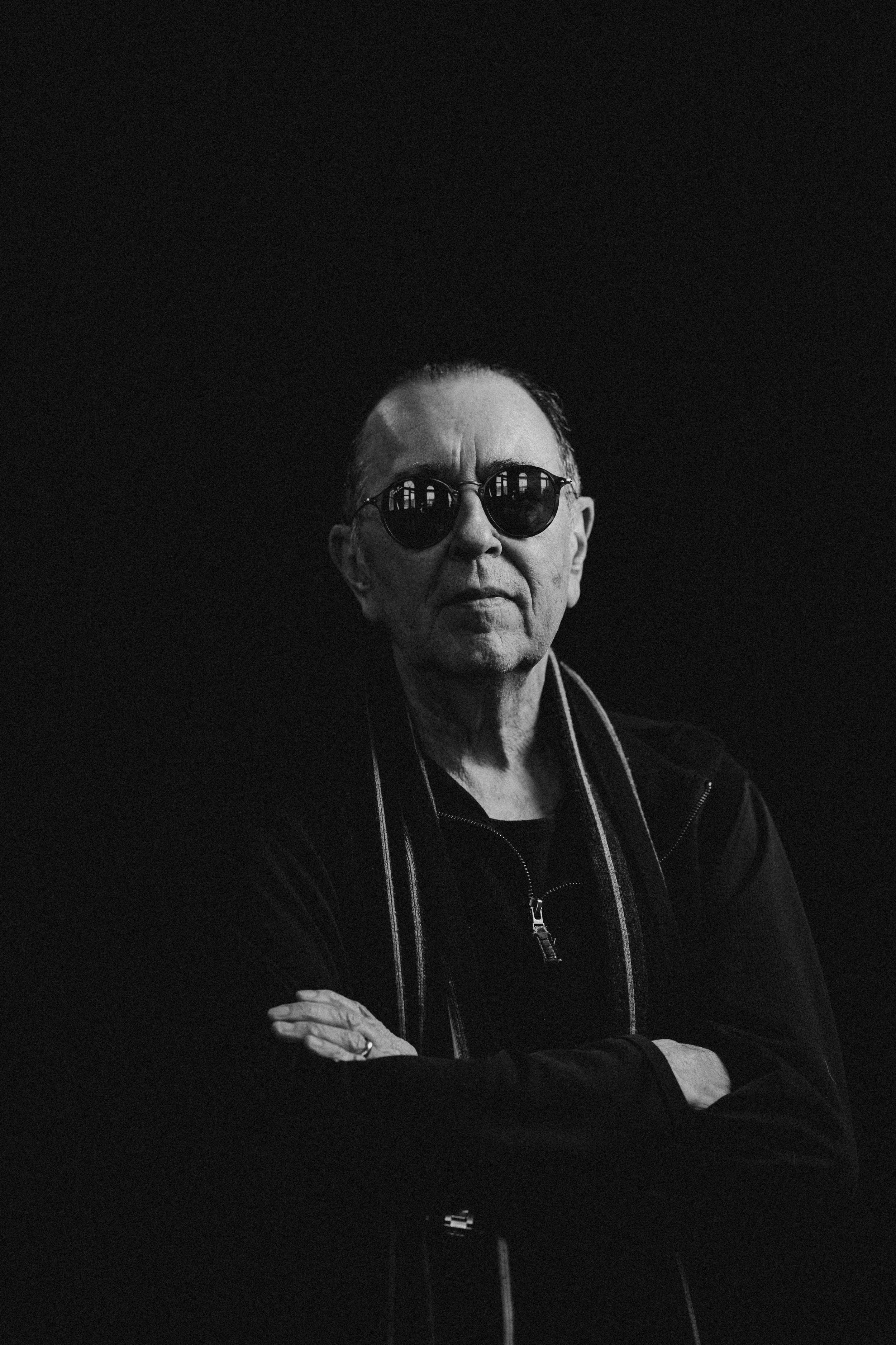 David Surkamp, singer and songwriter of Pavlov’s Dog, wearing sunglasses in a black-and-white portrait