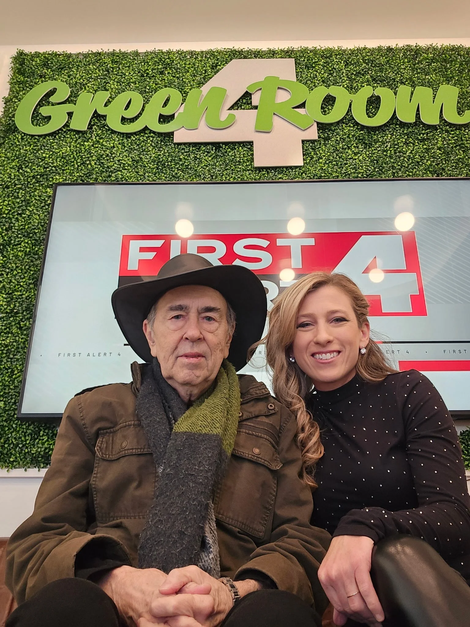 David Surkamp with a companion in the television studio green room.