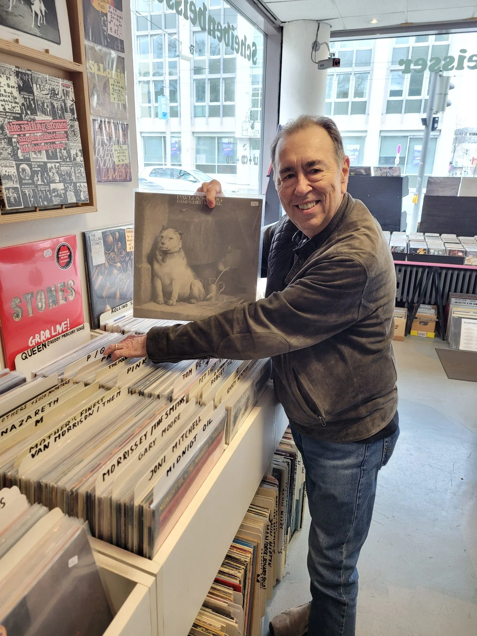 David Surkamp browsing records in a record shop.