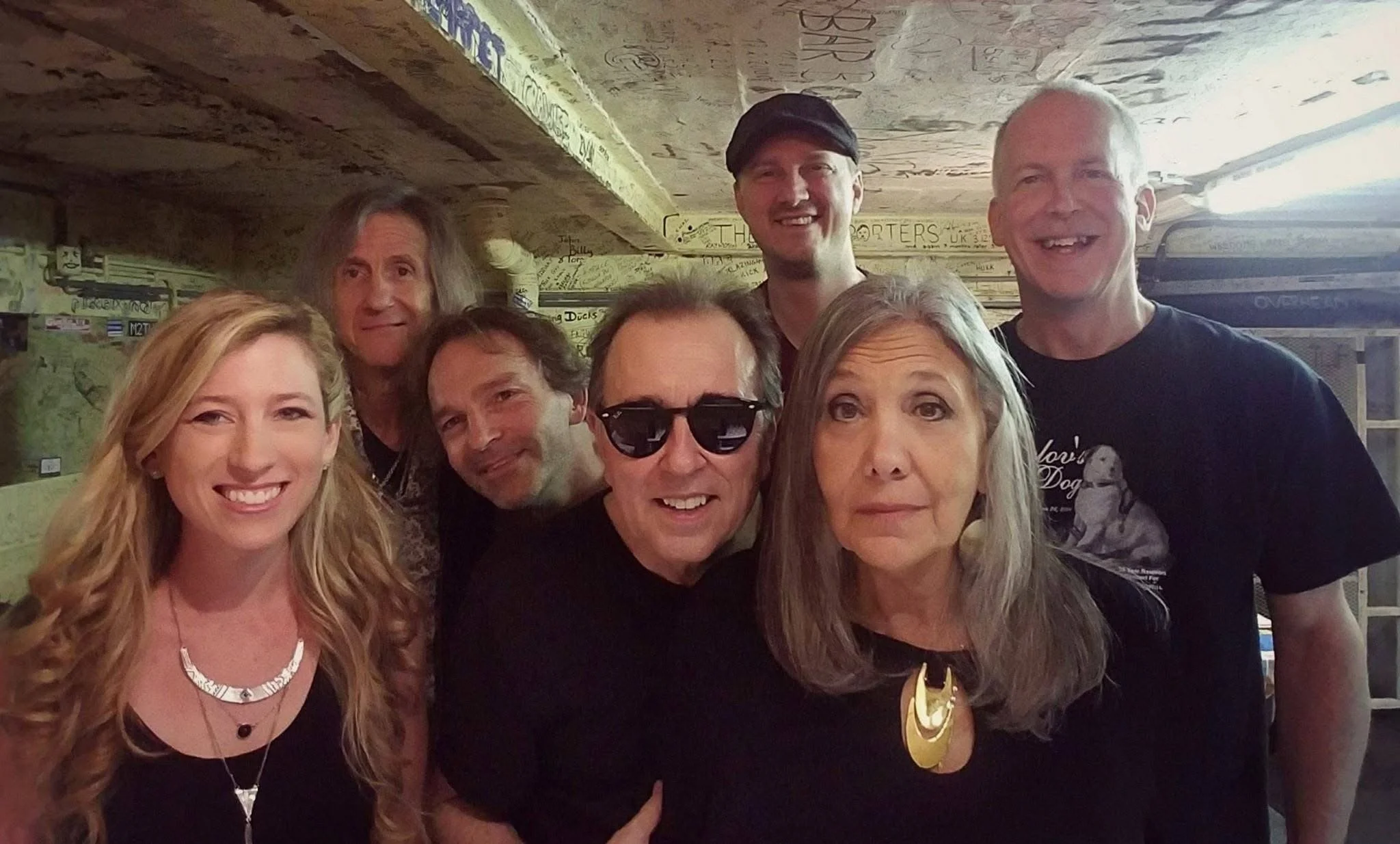 David Surkamp with a group backstage.