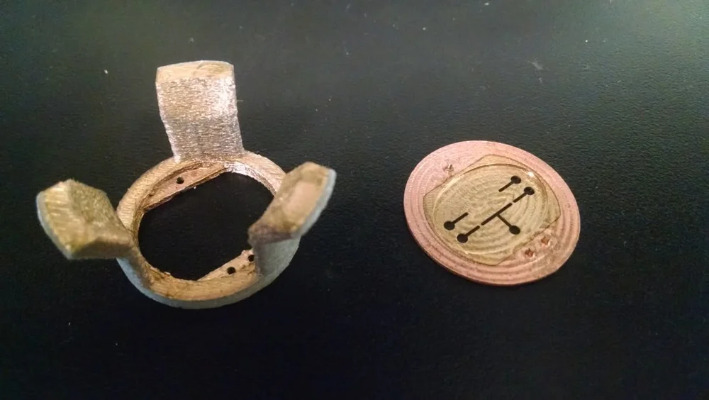 The 3D printed snap-in top and CNC machined mask bottom.