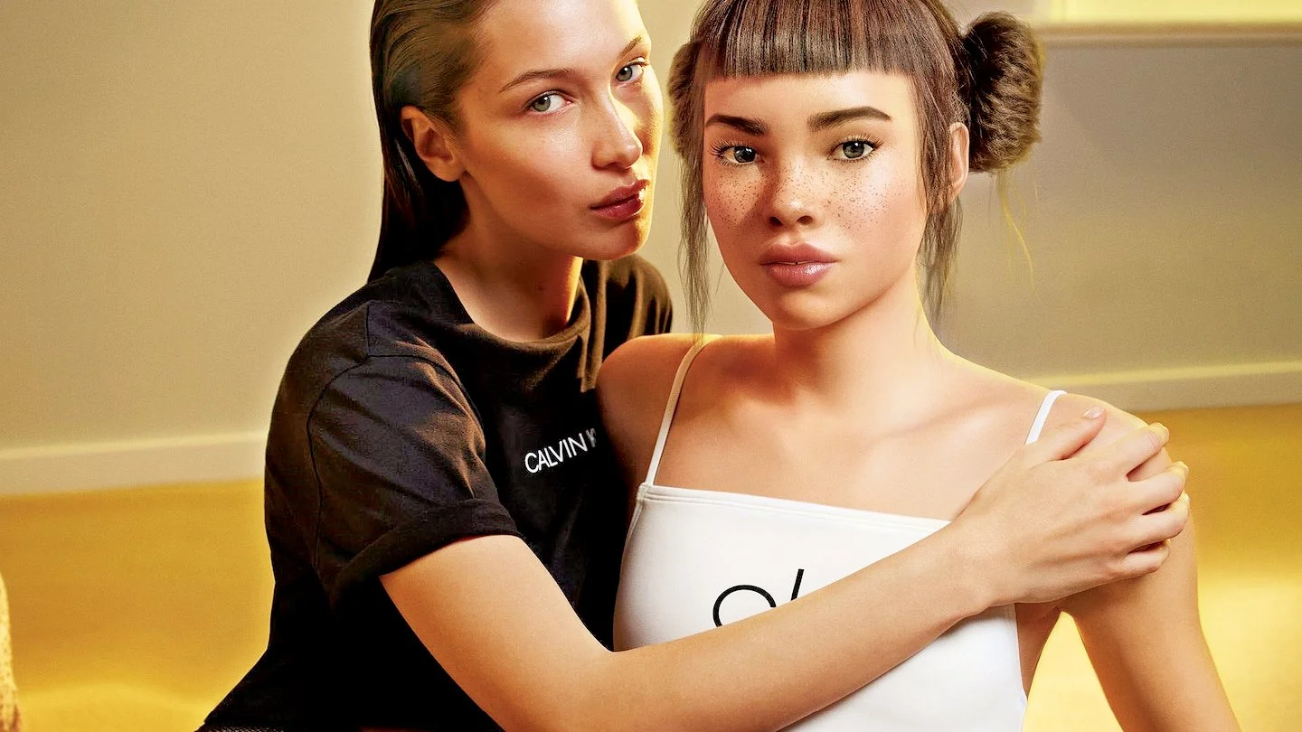 Two young women with light skin sitting close together, one with freckles and bangs, and the other with dark hair, in a warmly lit room.
