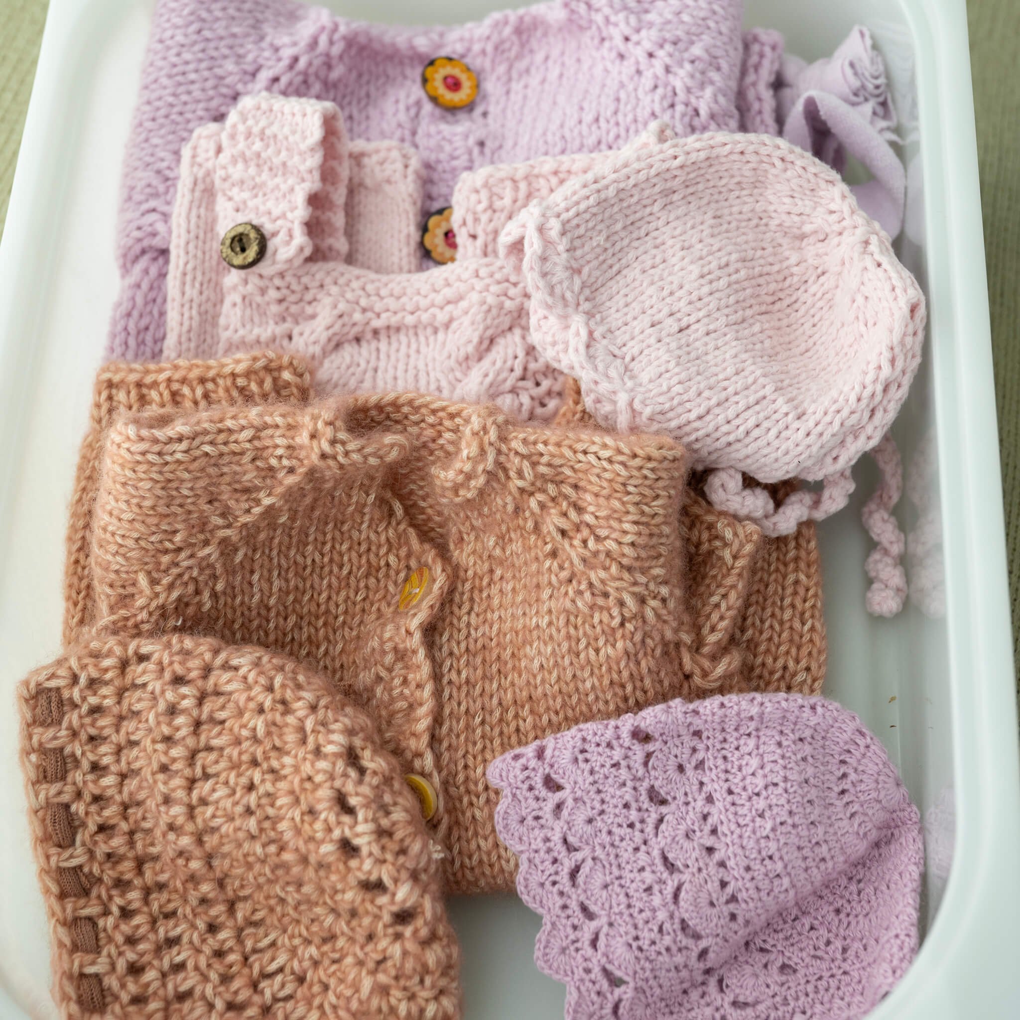 Knitted newborn girl outfits