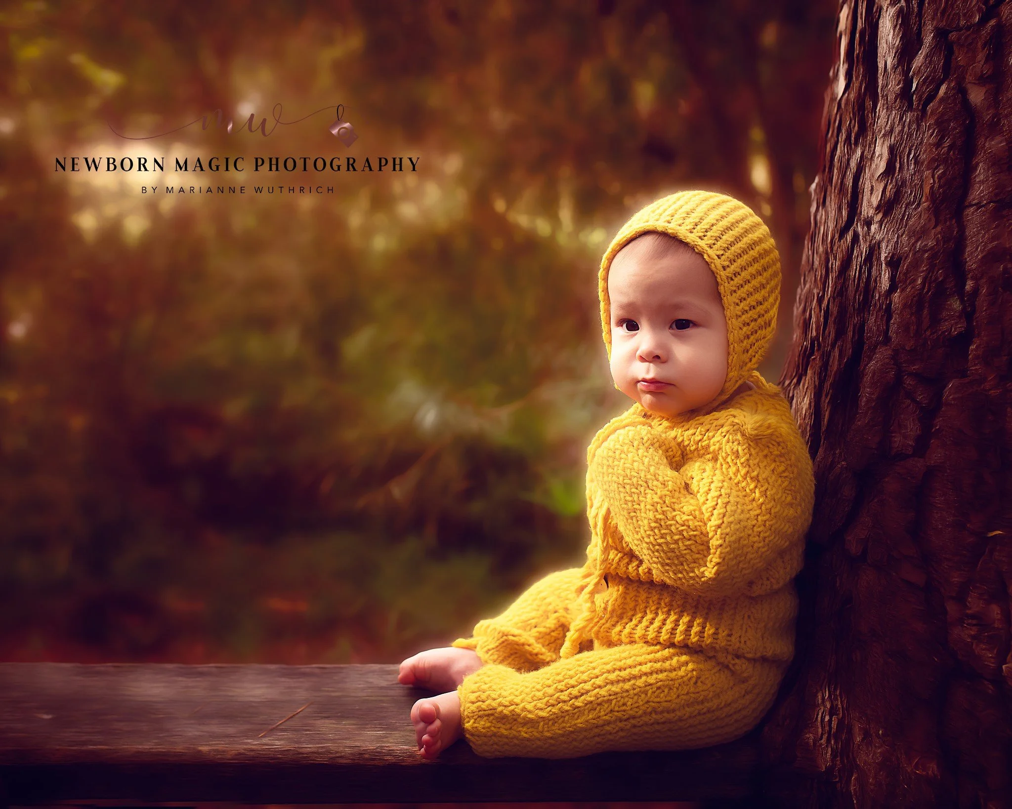 Baby boy in mustard knittwear