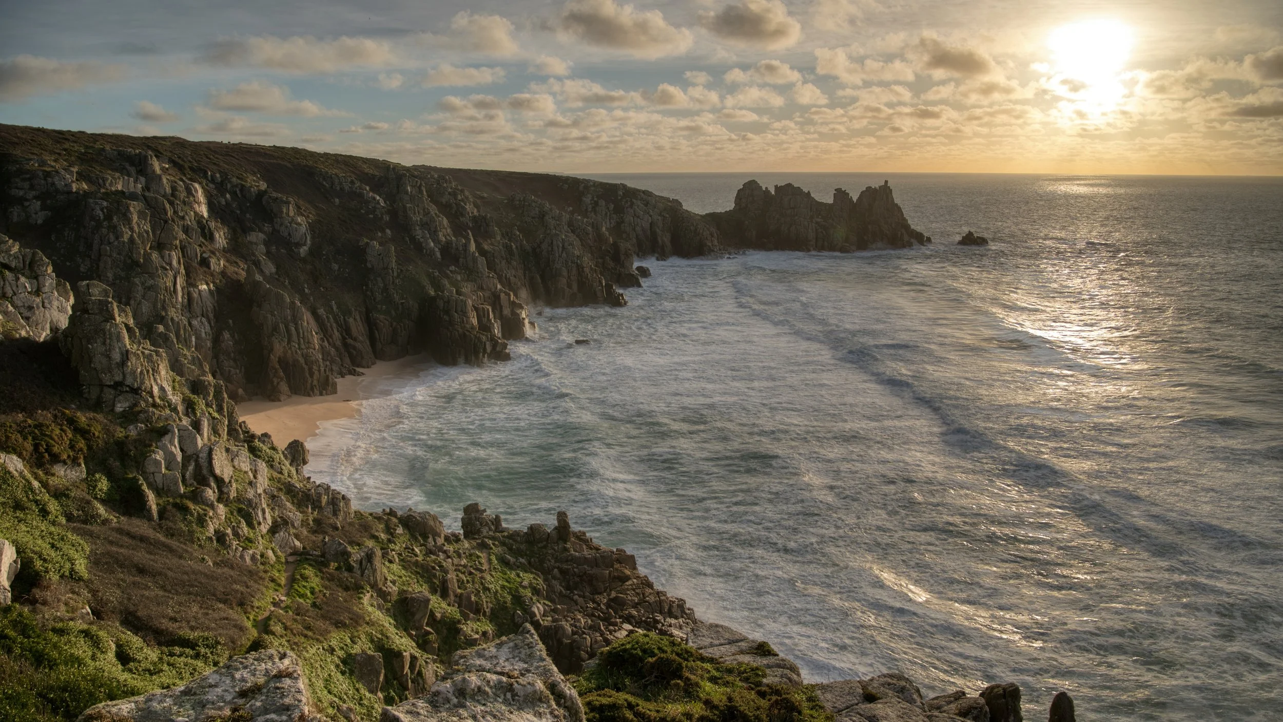 Sunrise over Pedn Vounder Beach and Logans Rock