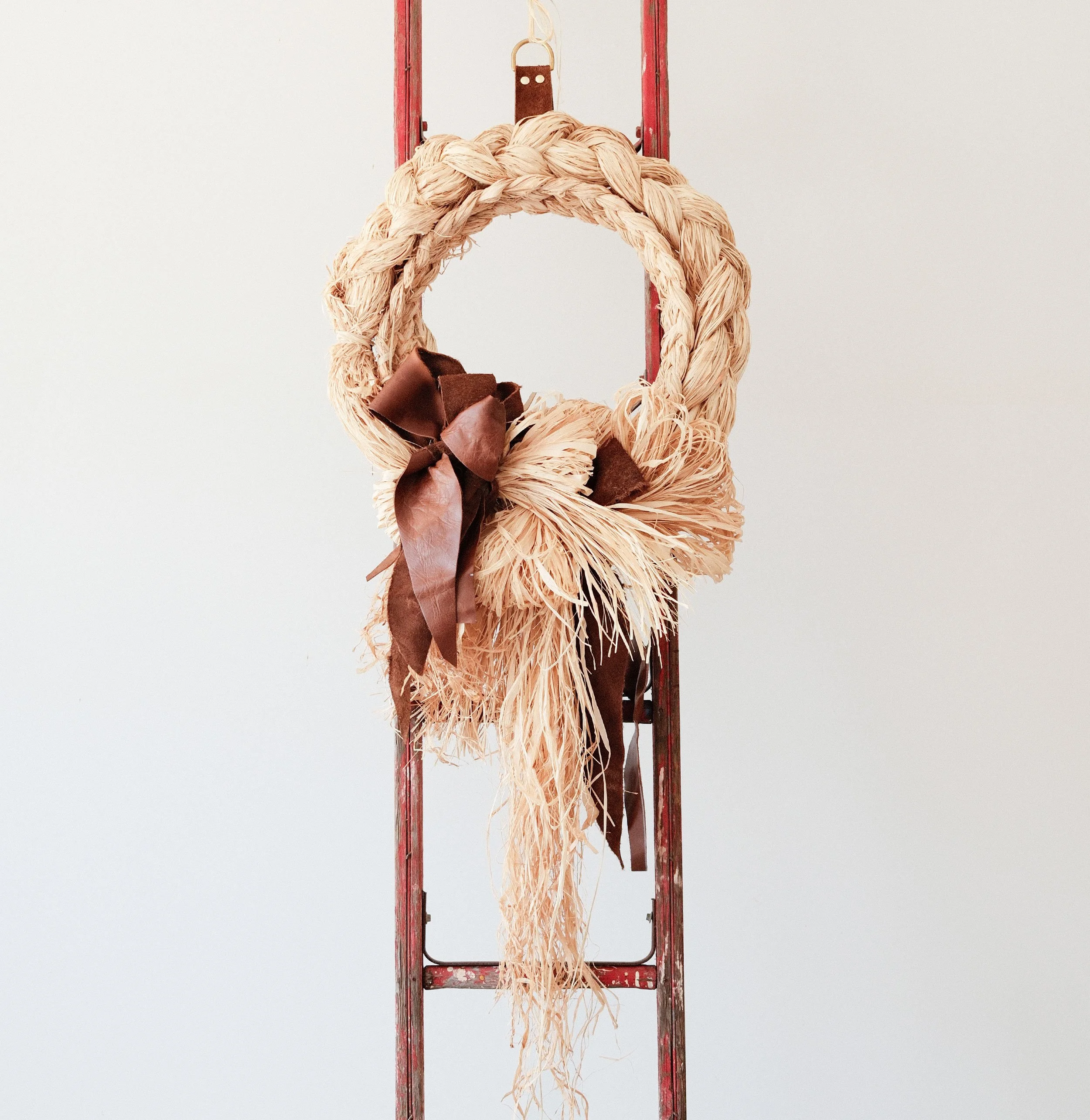 Raffia-Wreath-Natural-Leather-Hero-Web.jpg