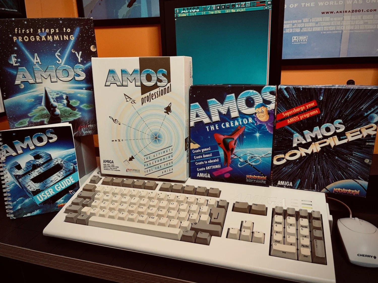 Collection of AMOS product boxes