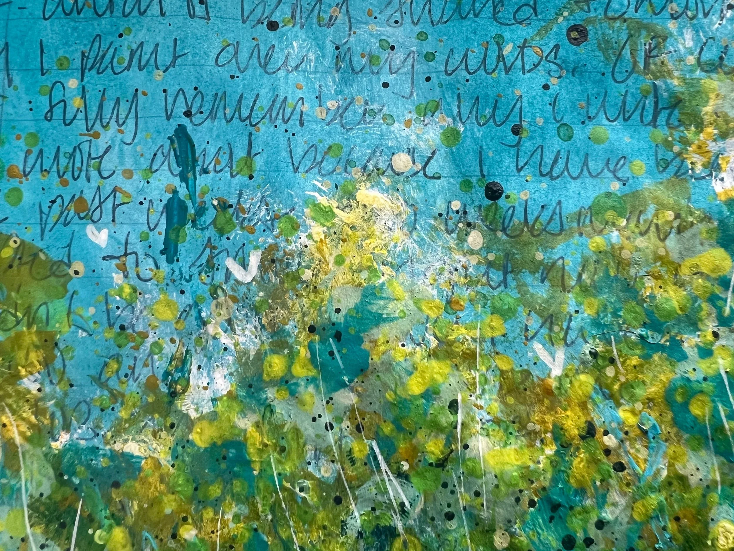 Mixed media art journal page with blue background, handwritten text, and layered green and white paint splatters.