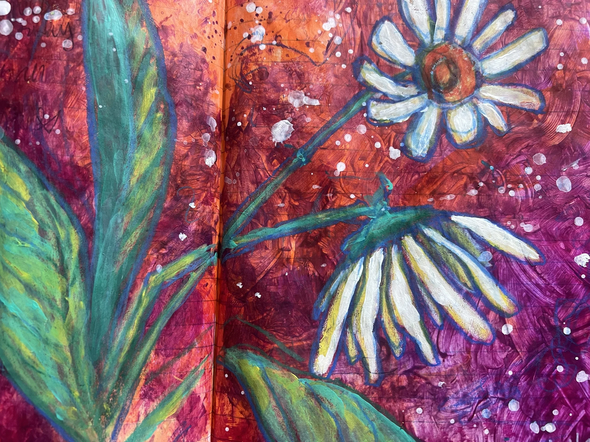 Art journal spread featuring a white daisy with ultramarine outlines on a red-orange painted background, with green leaves and white paint splatters.