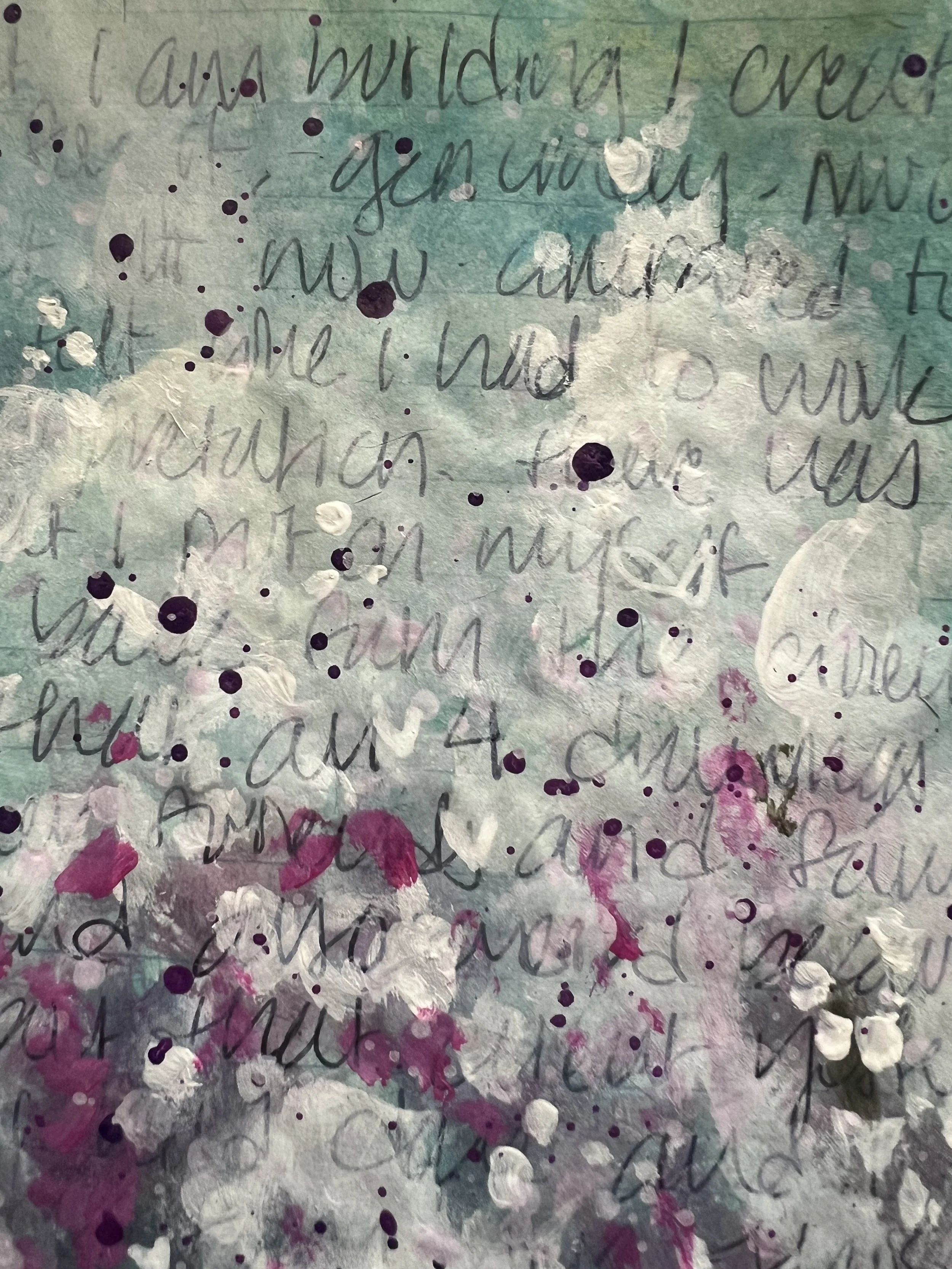 Mixed media art journal page with handwritten text partially covered by white and pink paint layers and splatters.