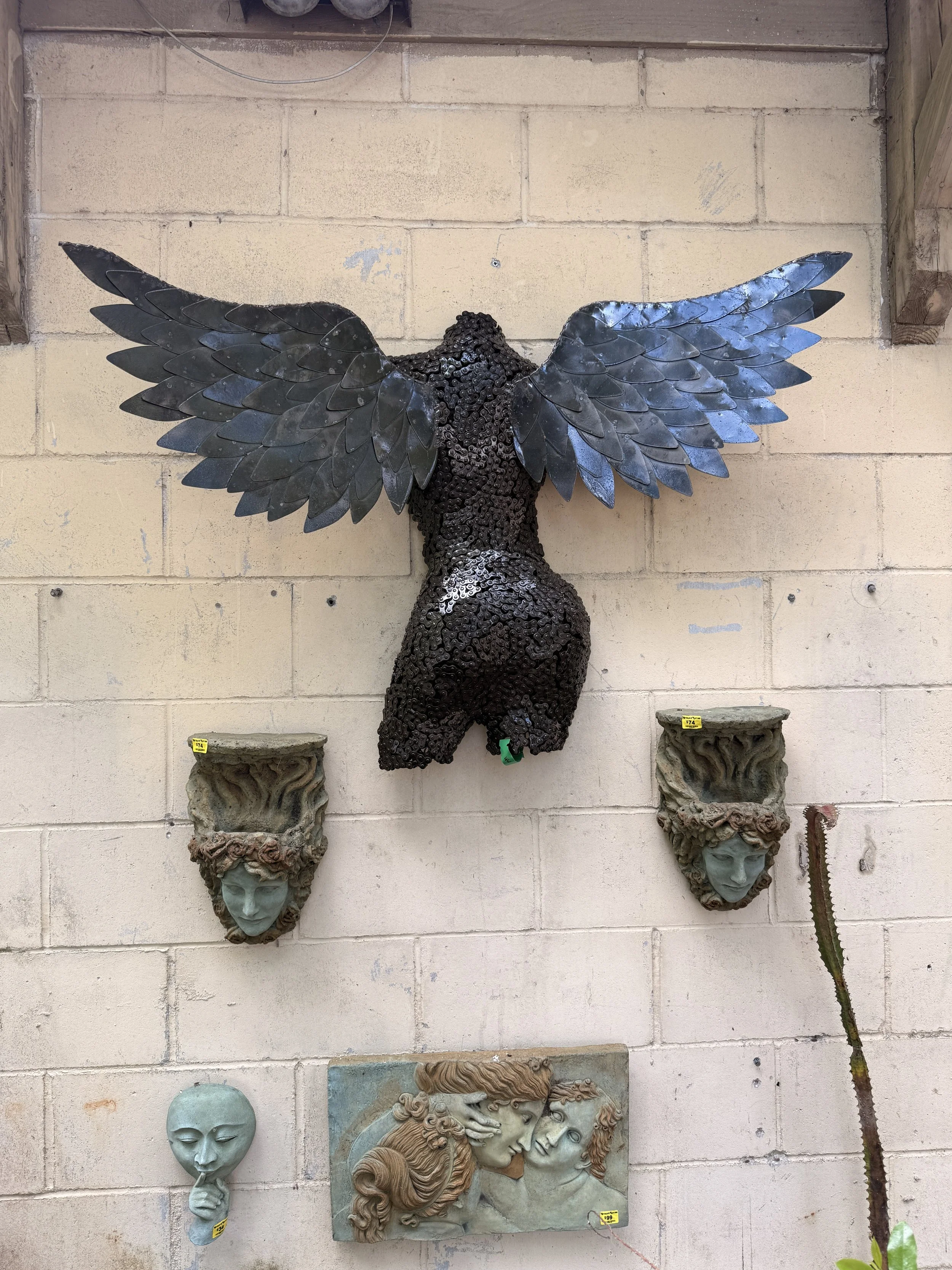 Winged Woman - $725  |  30" x 46" x 8" 