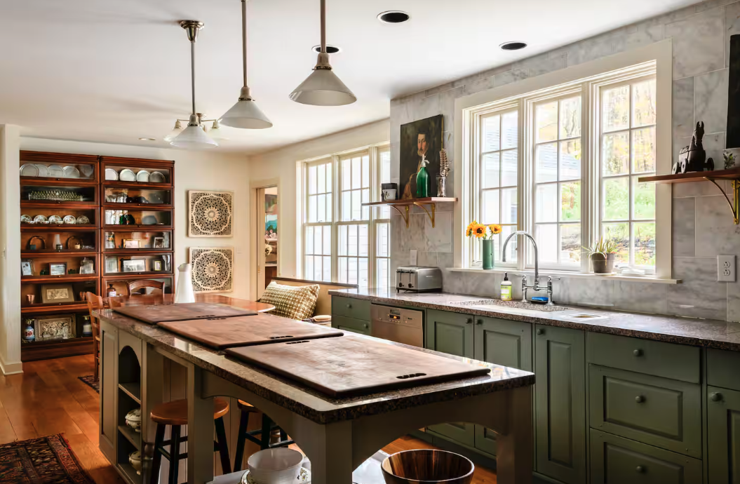 Airbnb kitchen interior from a Host and Stay client property with testimonial about increased bookings after optimization