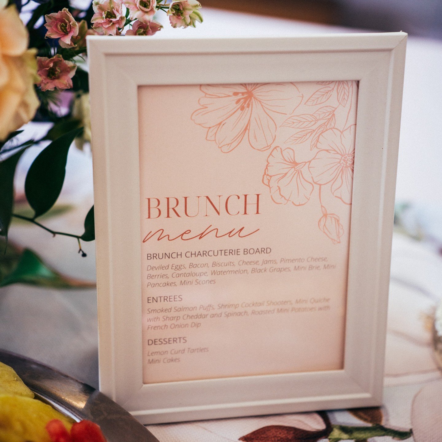 Swipe to see Summer's Bridal Brunch in all its whimsical glory. 🌸➡️

We're talking a full brunch charcuterie board, named mimosas, lemon curd tartlets, custom napkins, blue goblets, and enough flowers to make a florist cry happy tears. Absolute perf