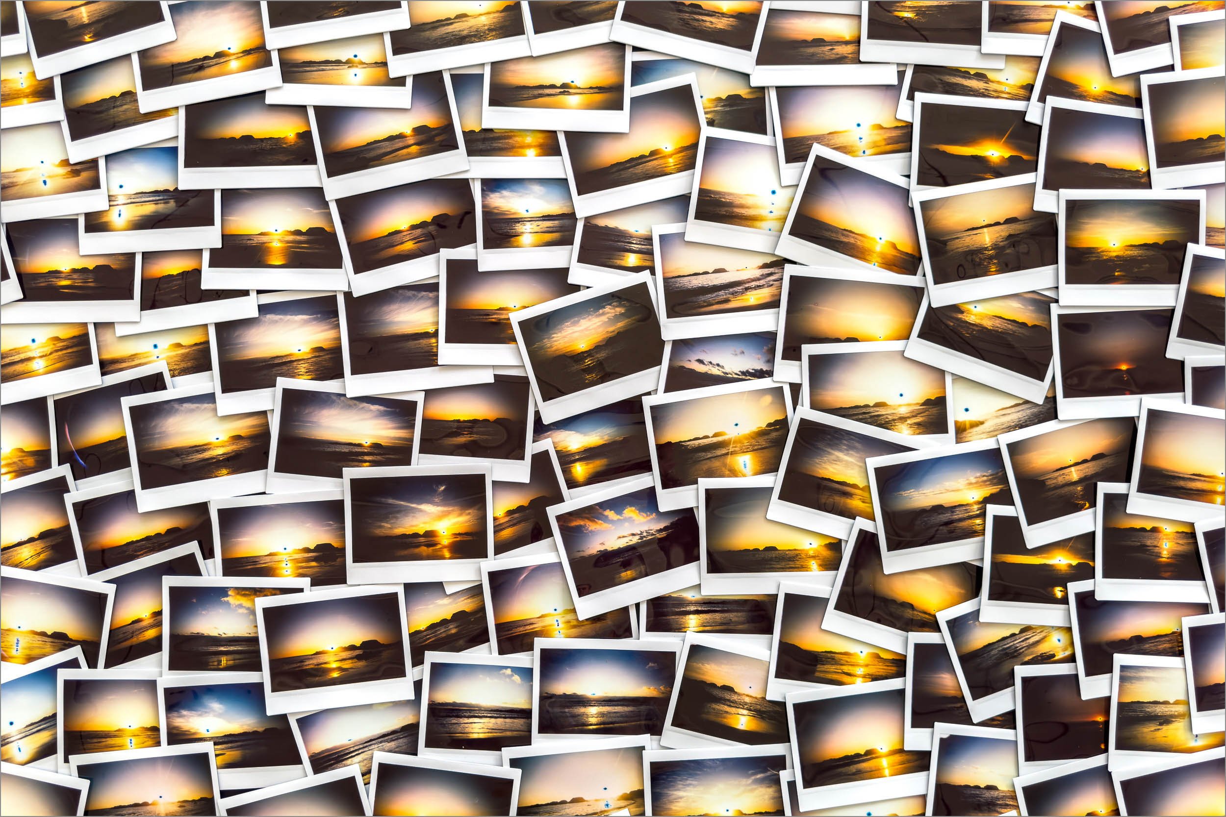 Hundreds of Sunset Polaroids on Table (Copy) (Copy) (Copy)