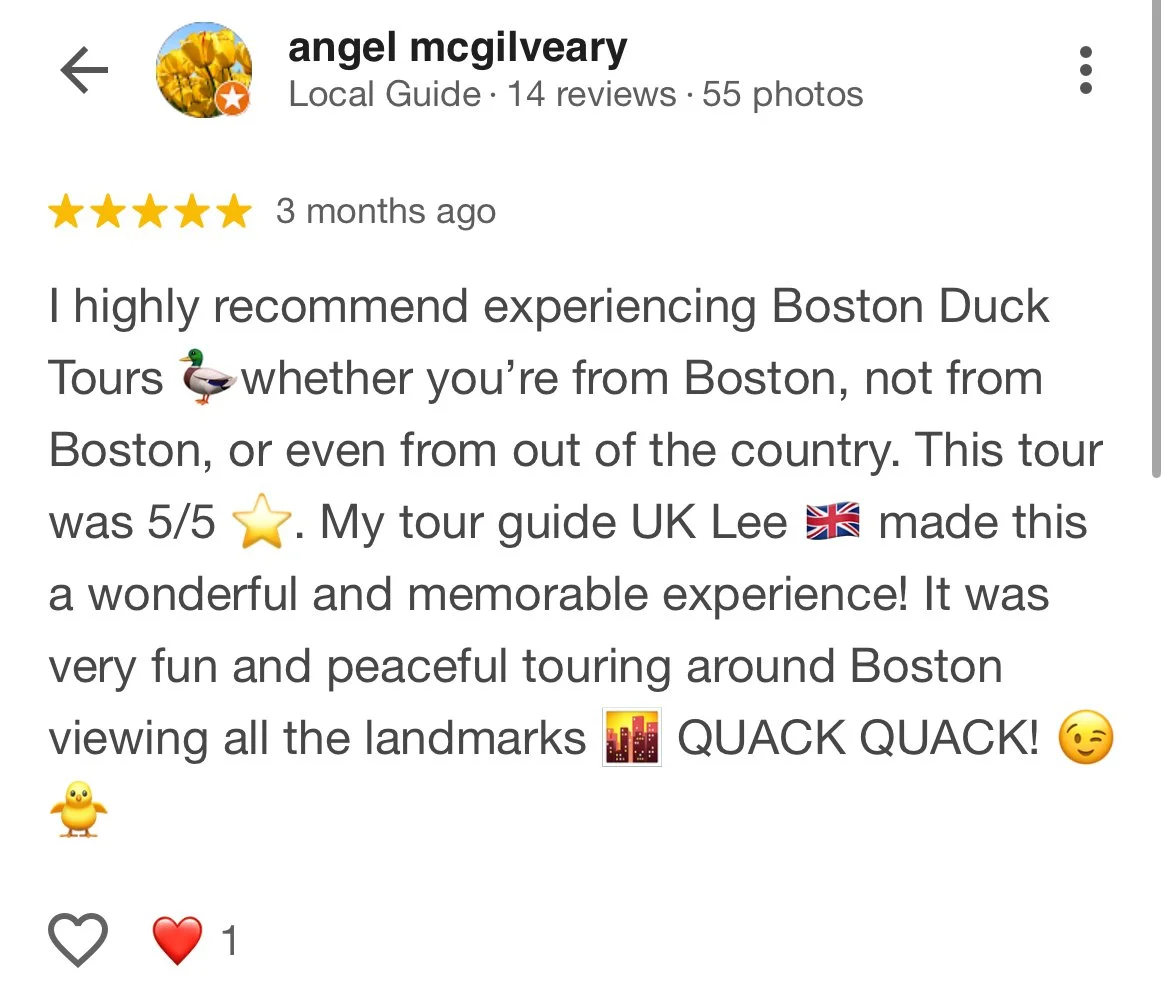 Screenshot of a Google review for a Boston Duck Tours experience, featuring five stars, emojis of a duck, a cityscape, and a winking face, along with text praising the tour guide and the experience.