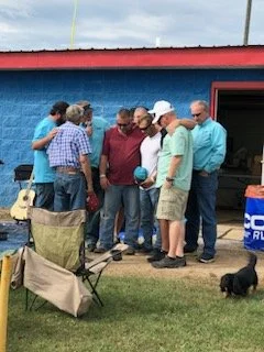 Worshiping and praying with a Race fan. 