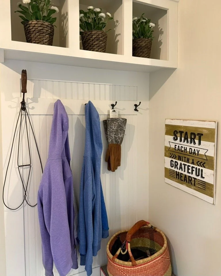 Your mudroom can do more than hold shoes ✨ Add a little art, a plant, or a touch that makes you smile &mdash; so the moment you walk in, you feel at home.
 💛
This client even made their dog the star, adding little touches that celebrate their furry 