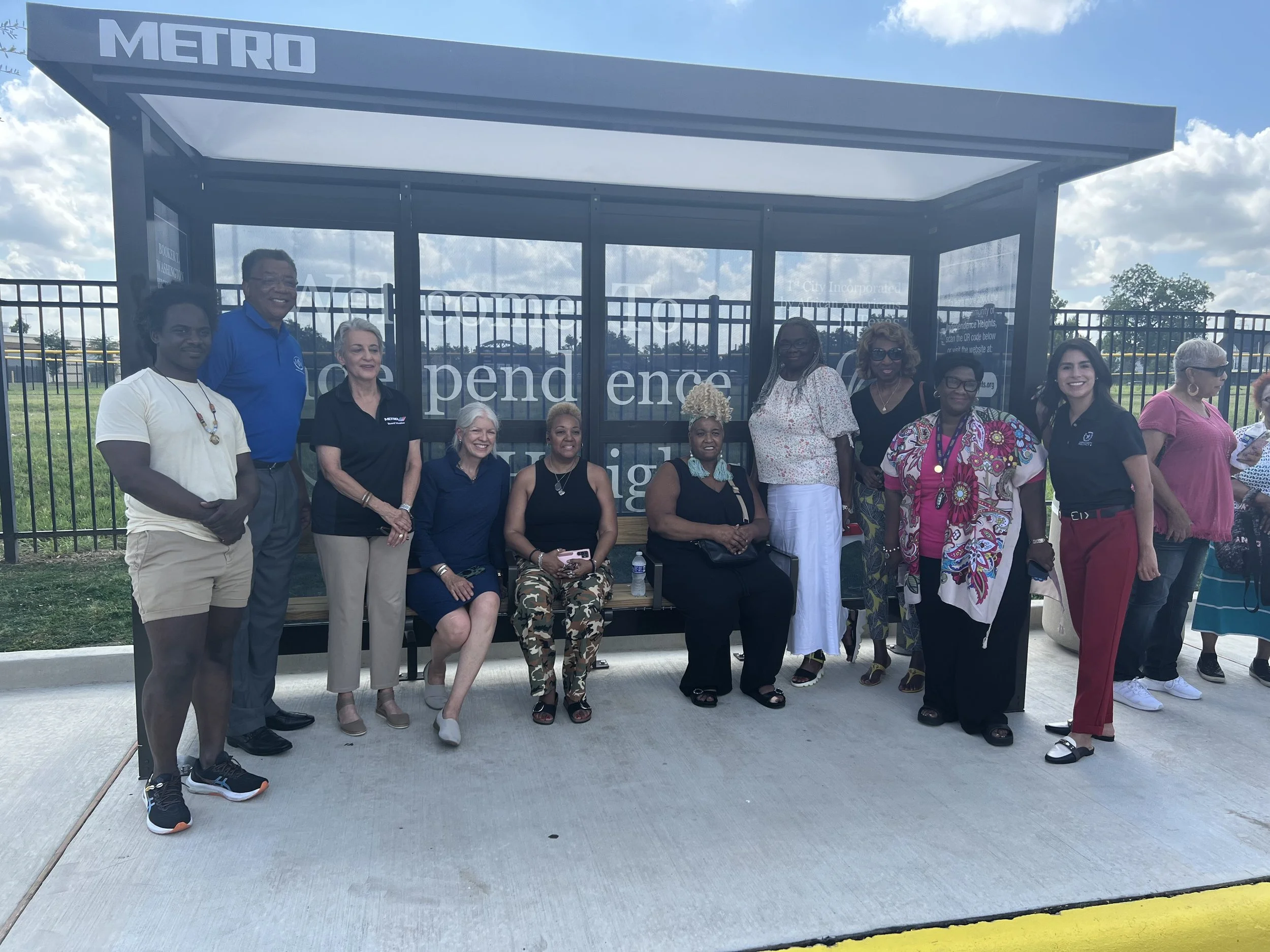 The board members of Metro, Congress woman Sheila Jackson Lee, the independence heights  redevelopment council, Miss Juneteenth Community descendants of Independence Heights as well as Danny Asberry El of Solel International is present.
