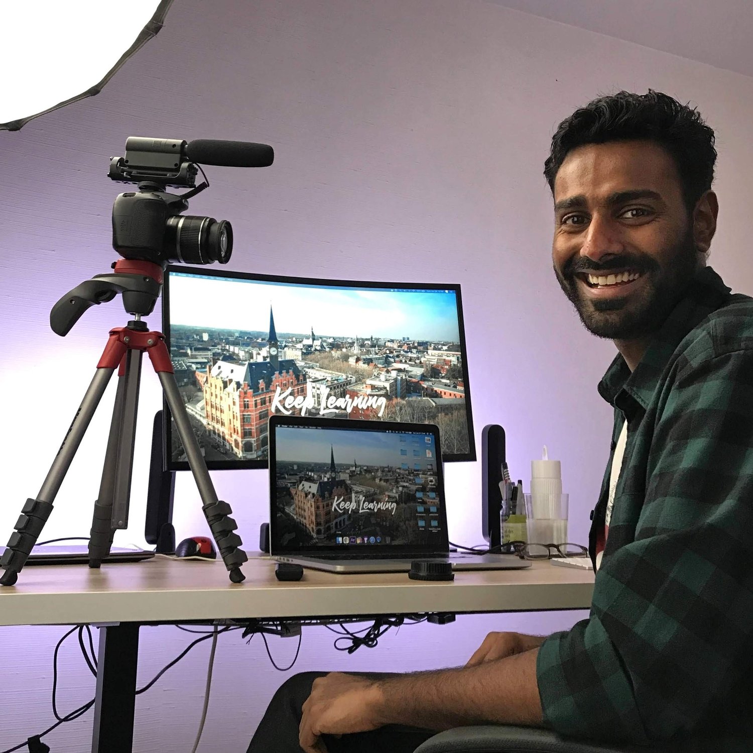 Josh at his desk in Paris
