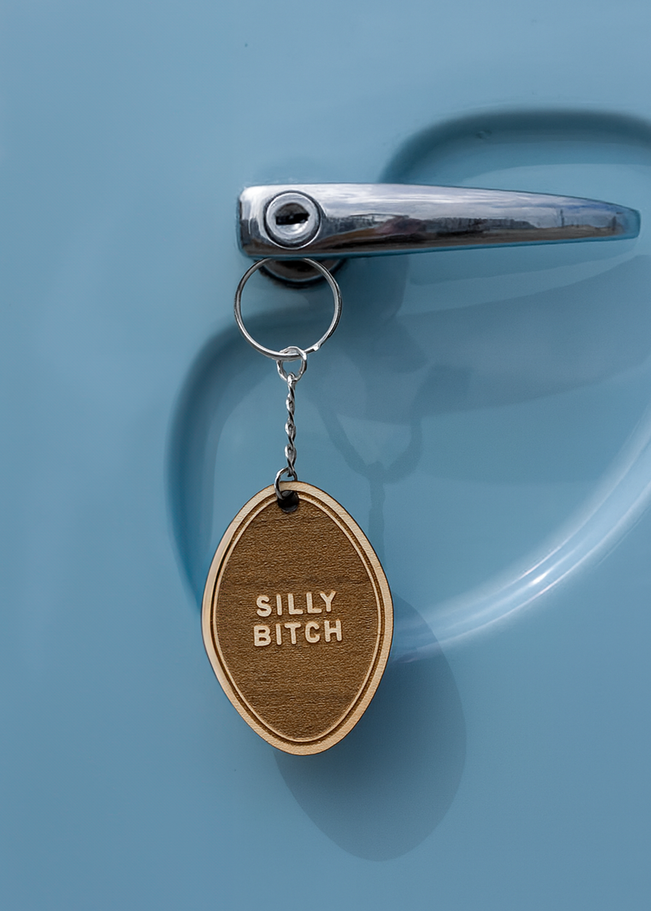 silly bitch wood keychain.png