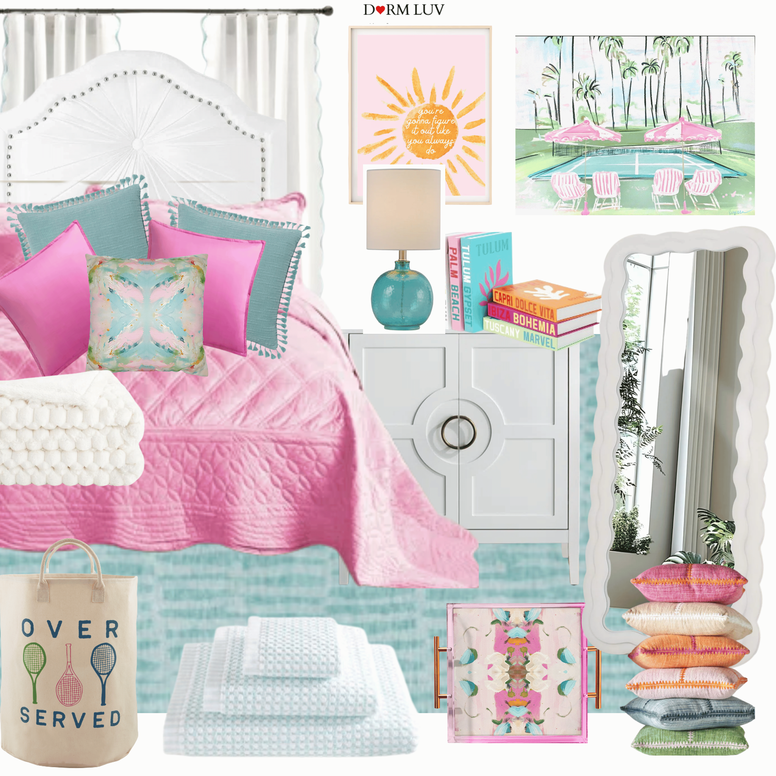 Colorful dorm room decor with pink bedspread, assorted pillows, white nightstand, lamp, framed art, and stacked books.