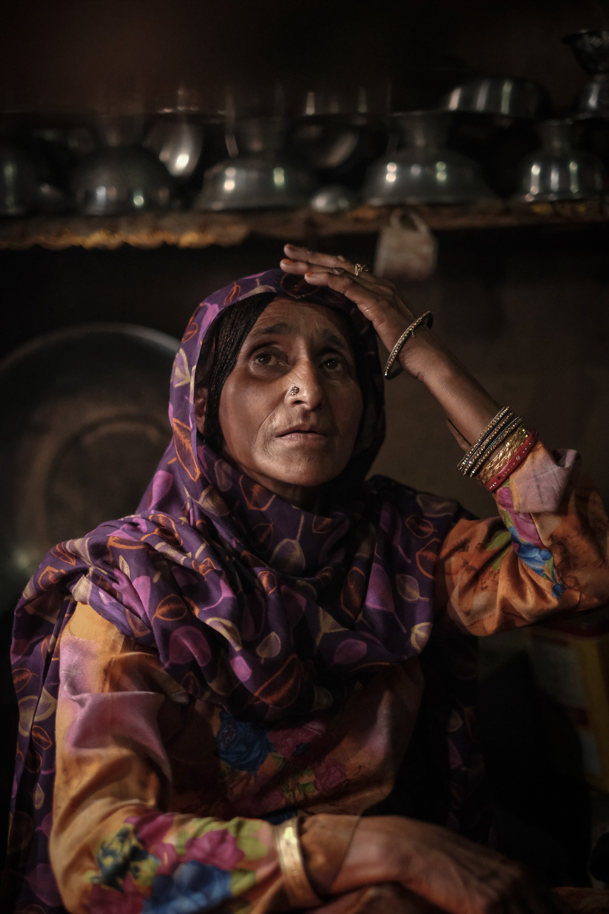 Bakarwal nomad in her temporary home built from mud and wood in Budgam district, in Indian-controlled Kashmir