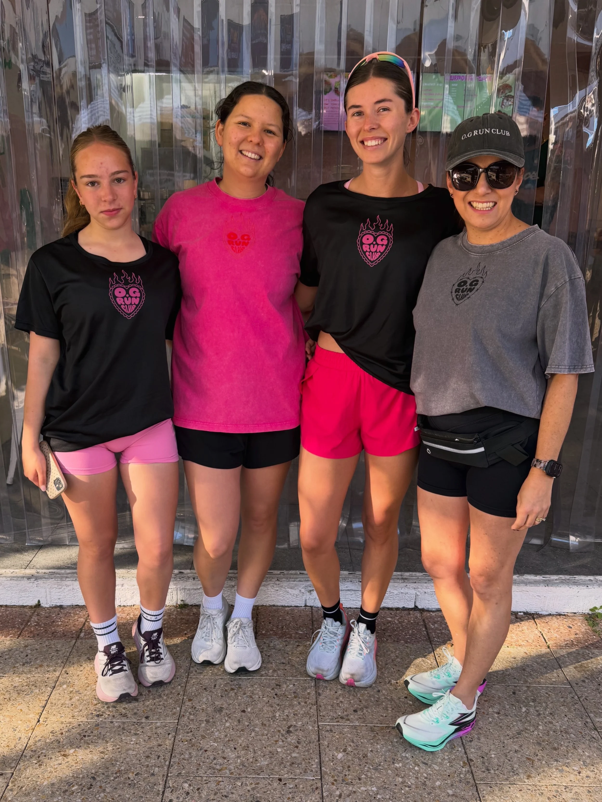 O.G Run Club runners in Gosford wearing O.G Run Club tees and caps