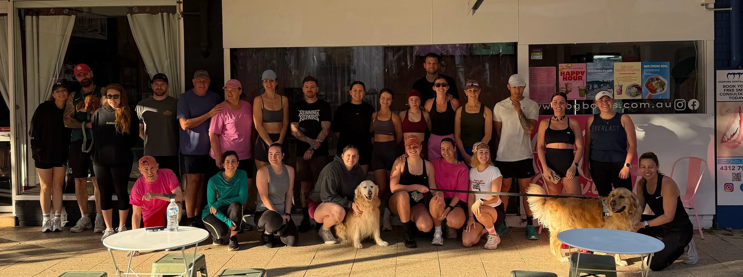 O.G Run Club group of runners and their dogs outside O.G Bowls in Gosford