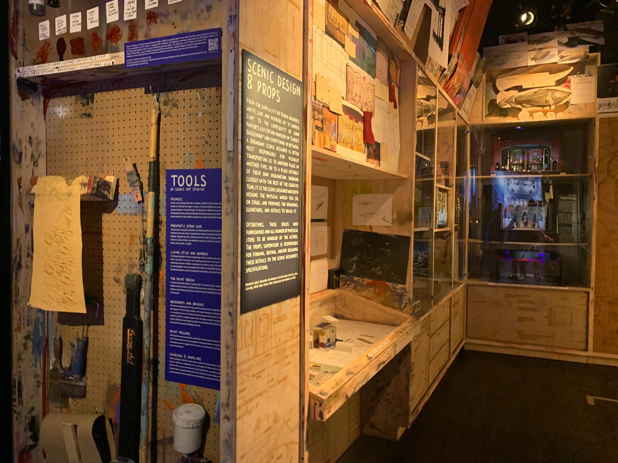  A section of the museum recreated to look like a wood shop where props and pieces of the set are assembled  