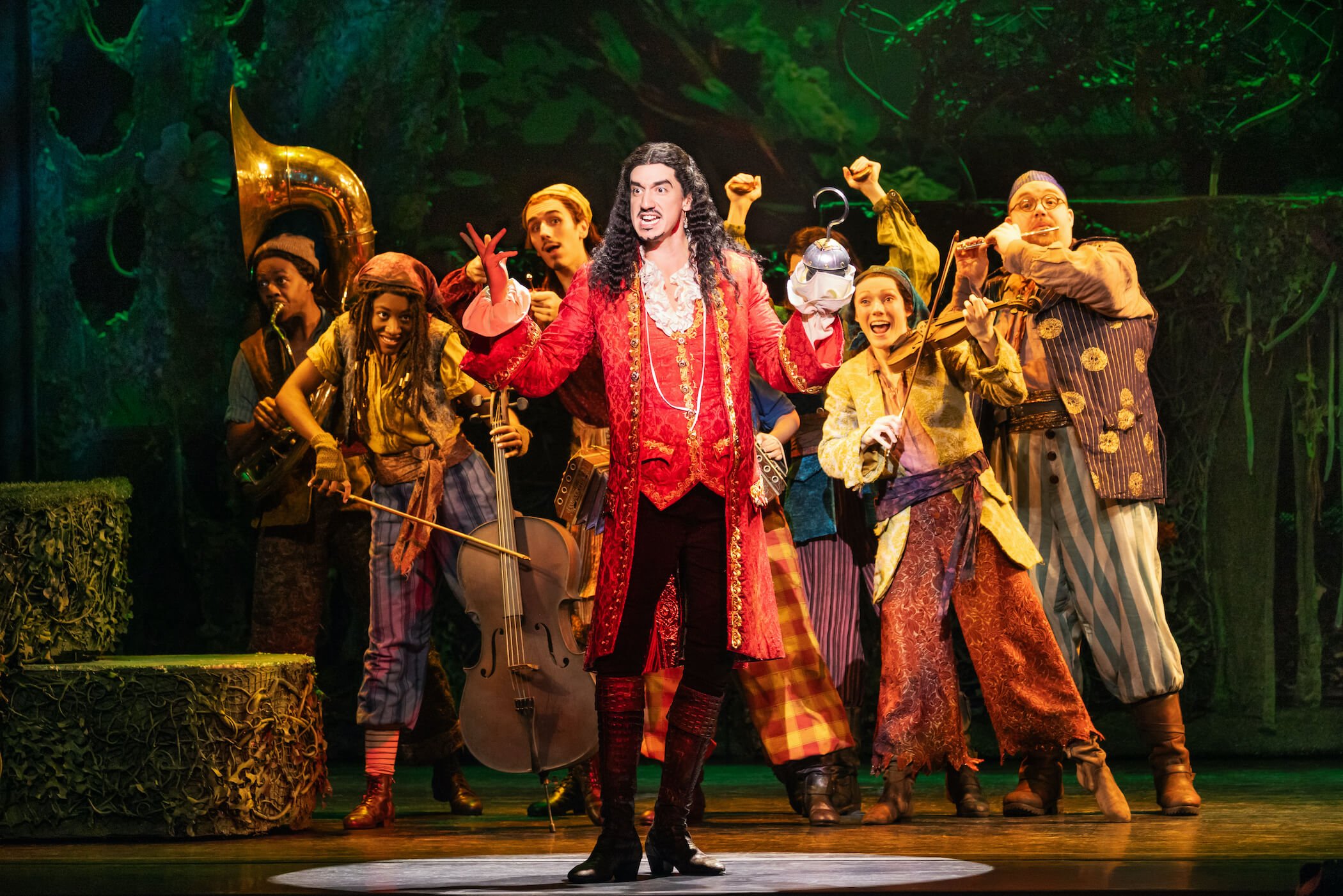  Cody Garcia as Captain Hook (center) and the cast of  Peter Pan  
