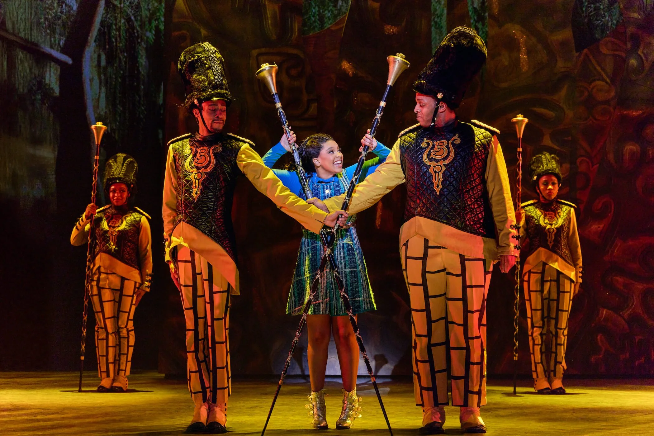 Dana Cimone as Dorothy and the ensemble as the Yellow Brick Road in The Wiz