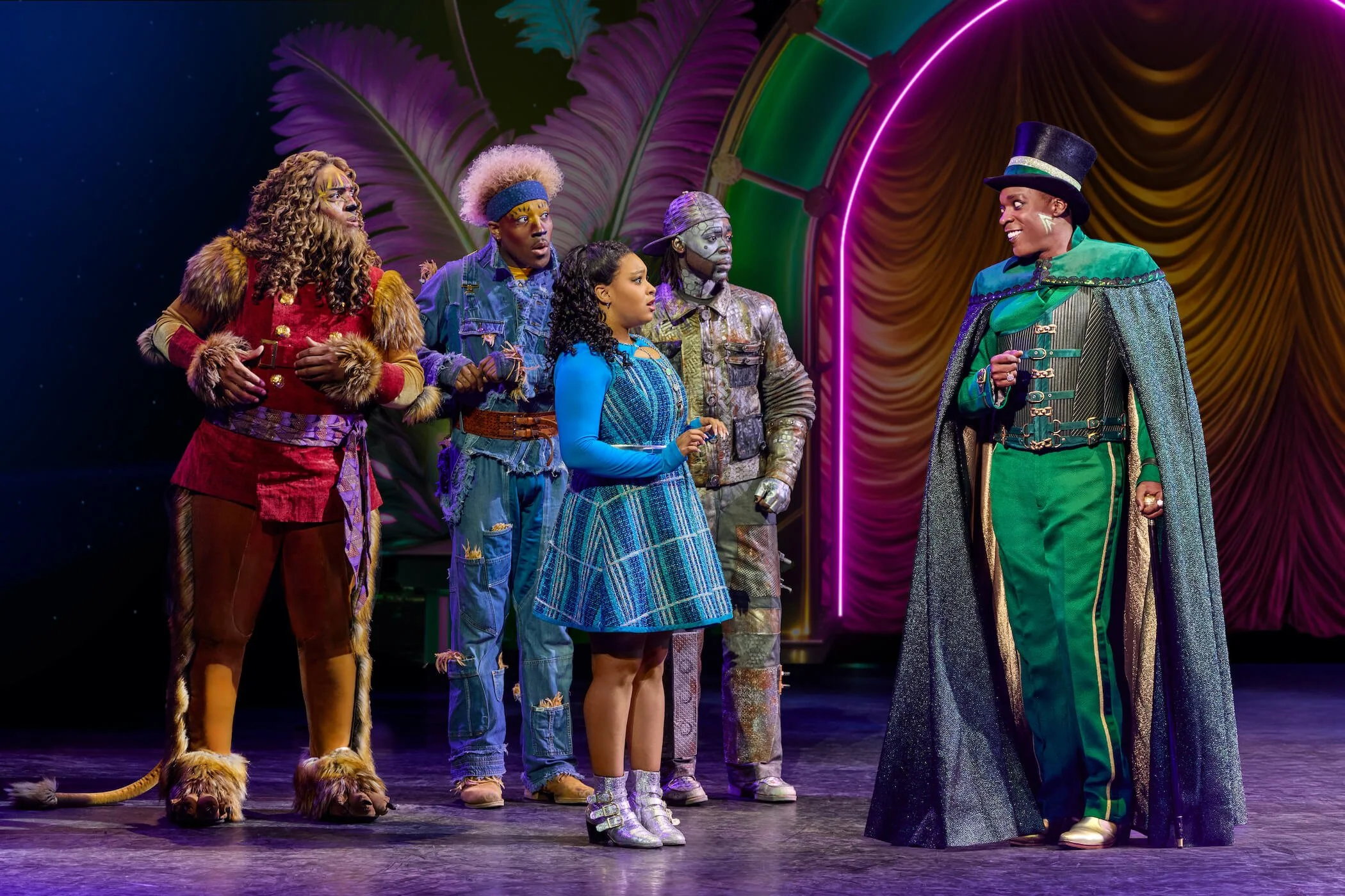 L-R: Cal Mitchell as the Lion, Elijah Ahmad Lewis as the Scarecrow, Dana Cimone as Dorothy, and Alan Mingo Jr as The Wiz in The Wiz