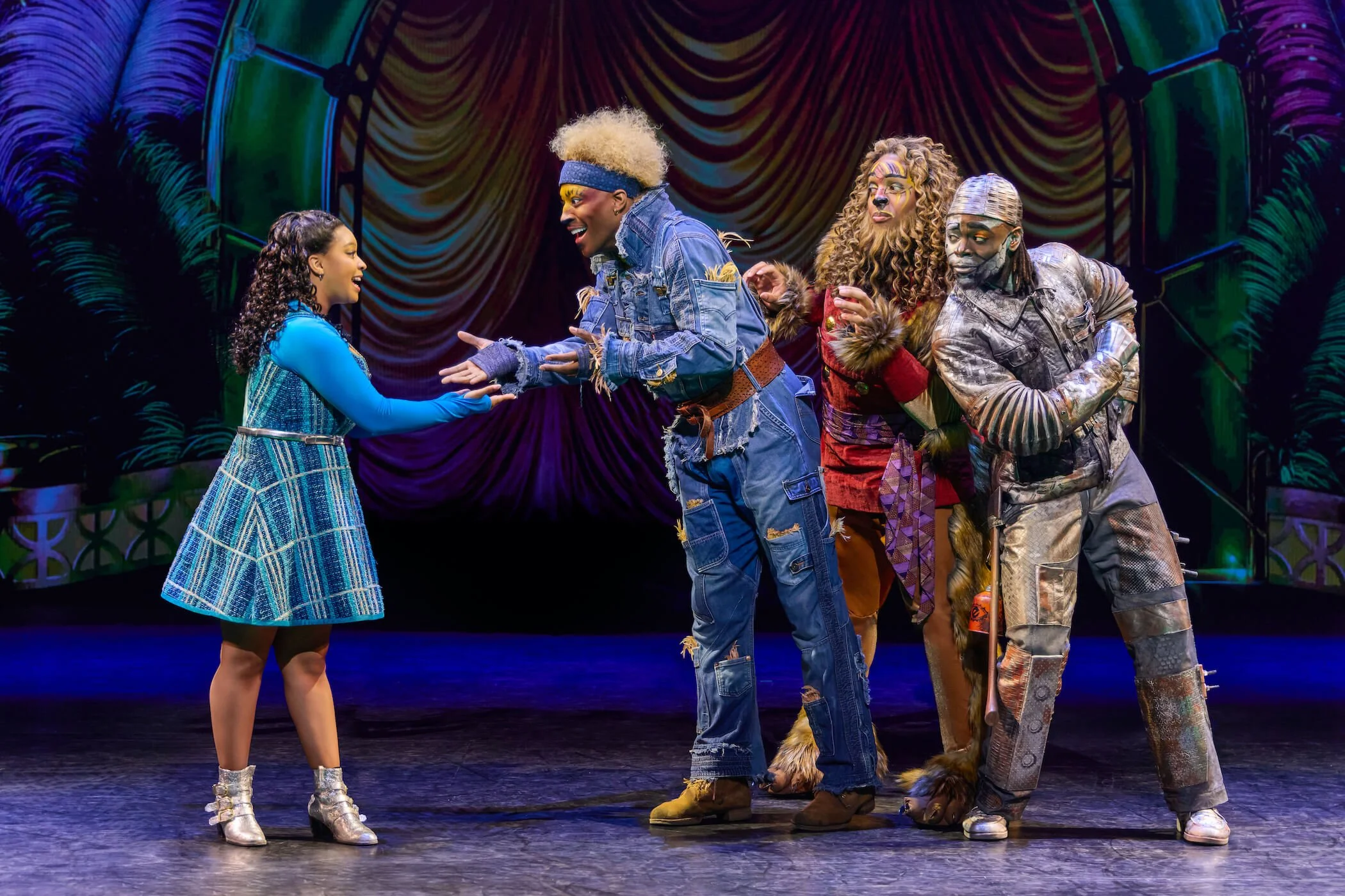L-R: Dana Cimone as Dorothy, Elijah Ahmad Lewis as the Scarecrow, Cal Mitchell as the Lion, and D. Jerome as the Tinman in The Wiz