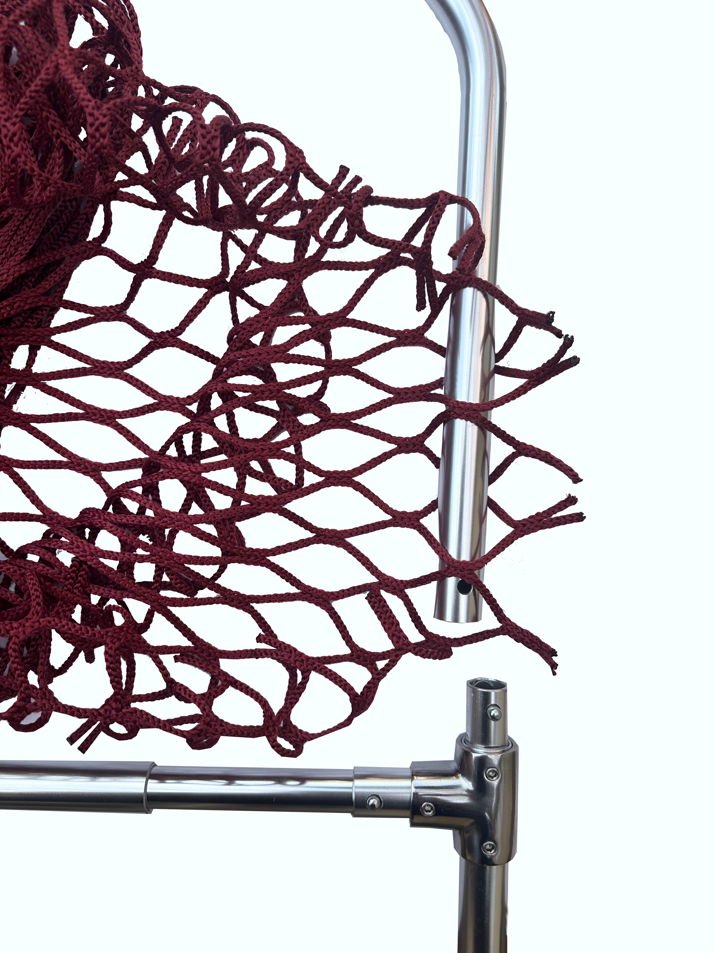 Fence Top Feeder -loading-hay-net-onto-c-section.png