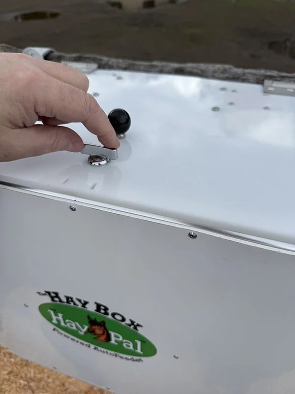 HayBox-battery-powered-auto-feeder-by-HayPal-lid-that-locks.jpeg