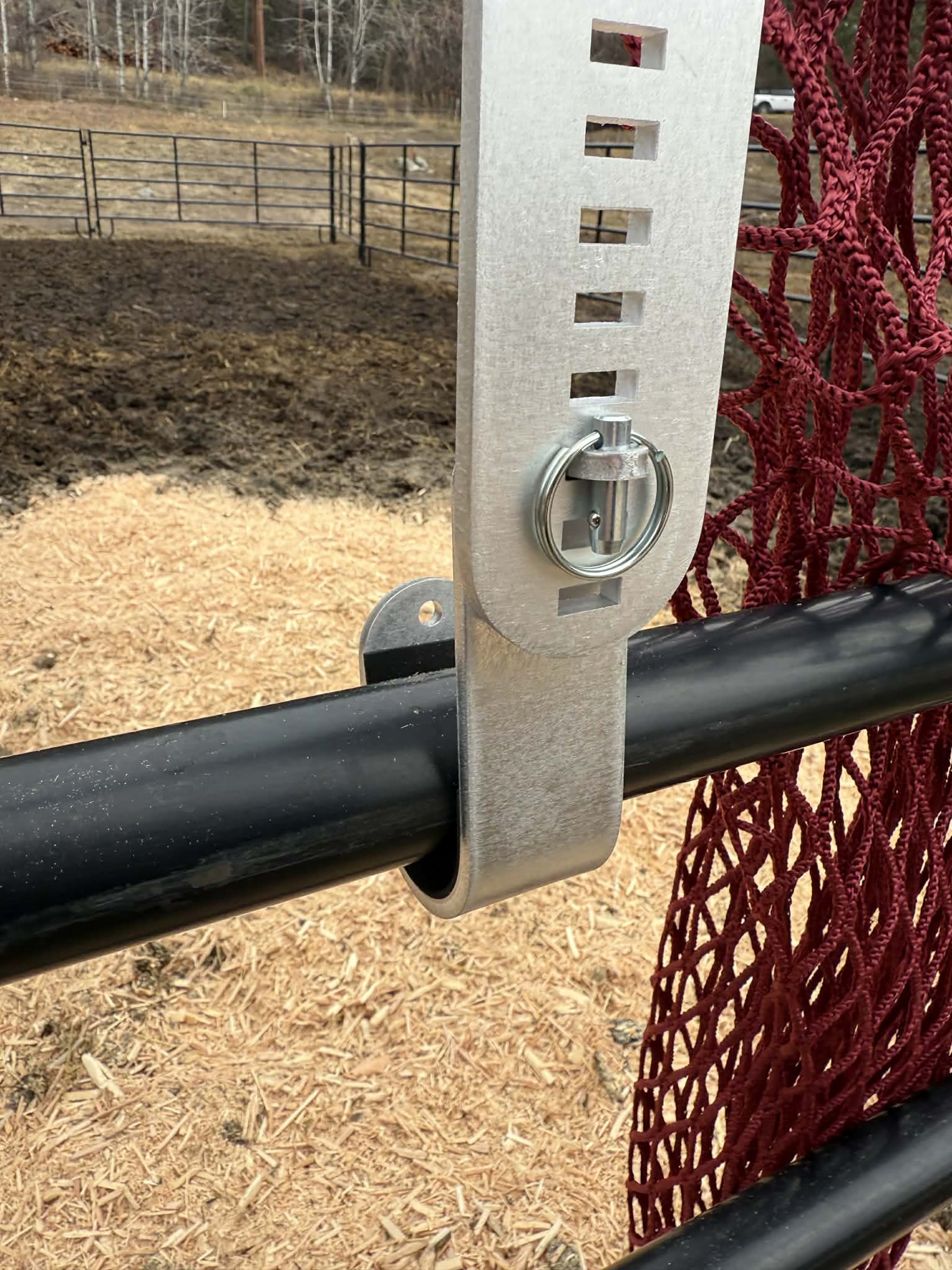 HayPal-portable-fence-feeder-lower-hook-installation.jpg