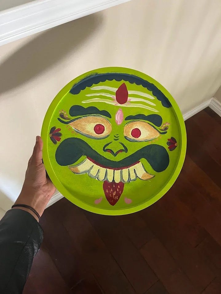 green drishti bommai.jpg