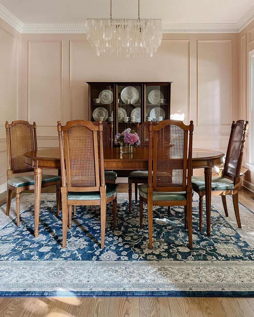 This gorgeous pink dining room is by @beholdinghome from the spring '22 ORC! Natalie said she didn't want the space to feel overly formal or stuffy, so choosing pink for the walls was a brilliant choice to play off of the traditional furniture.⁣
#one