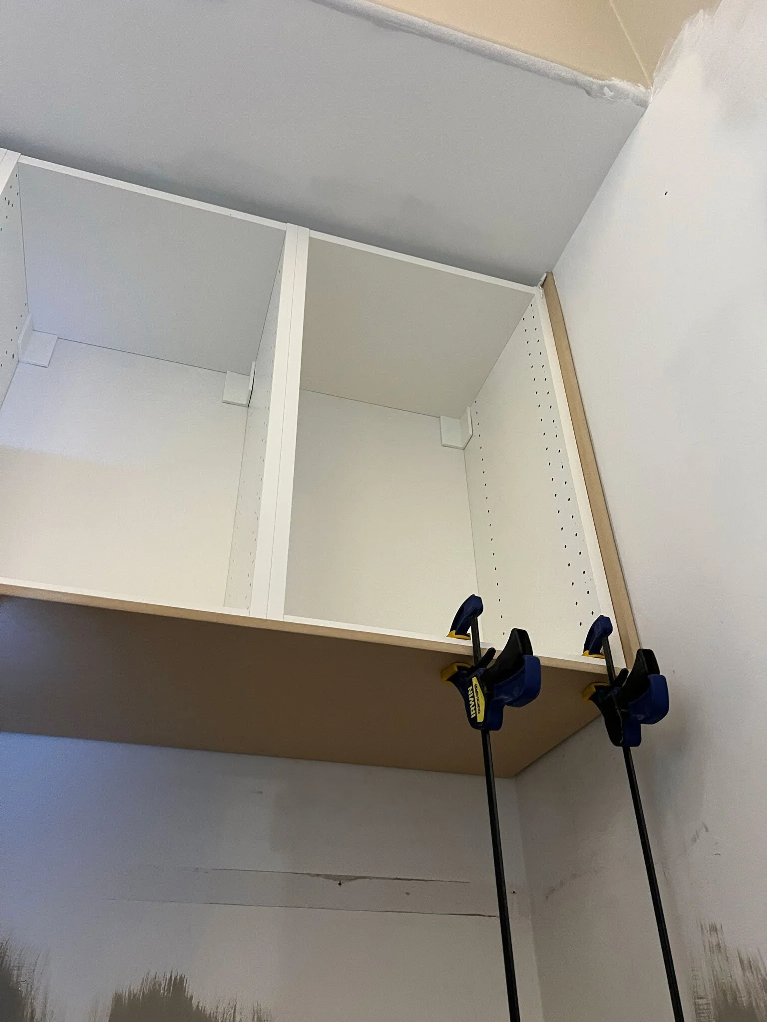 bottom-and-side-pieces-on-IKEA-cabinets.jpg