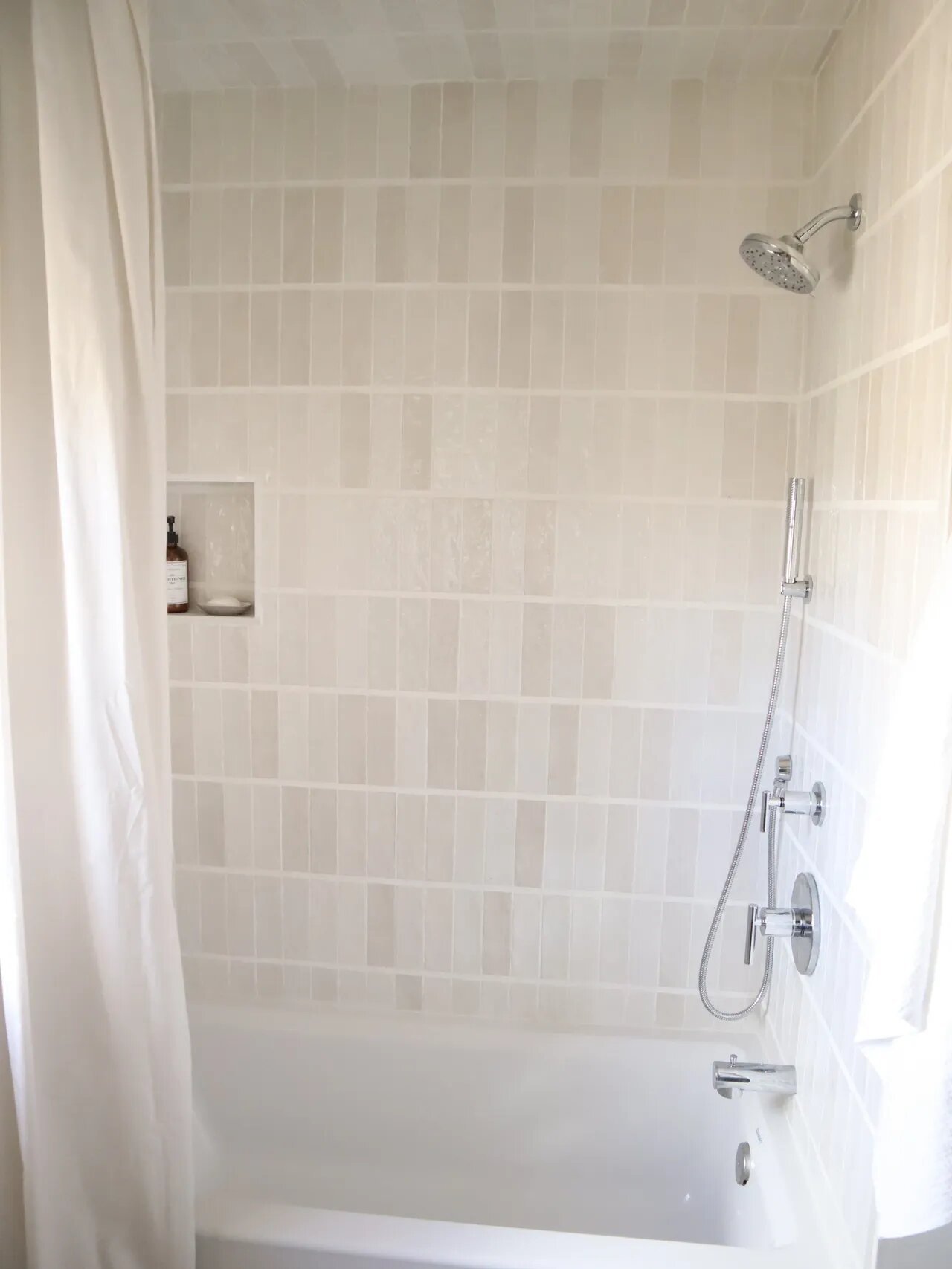 noire-motif-bathroom-makeover-shower-tile-after.jpg