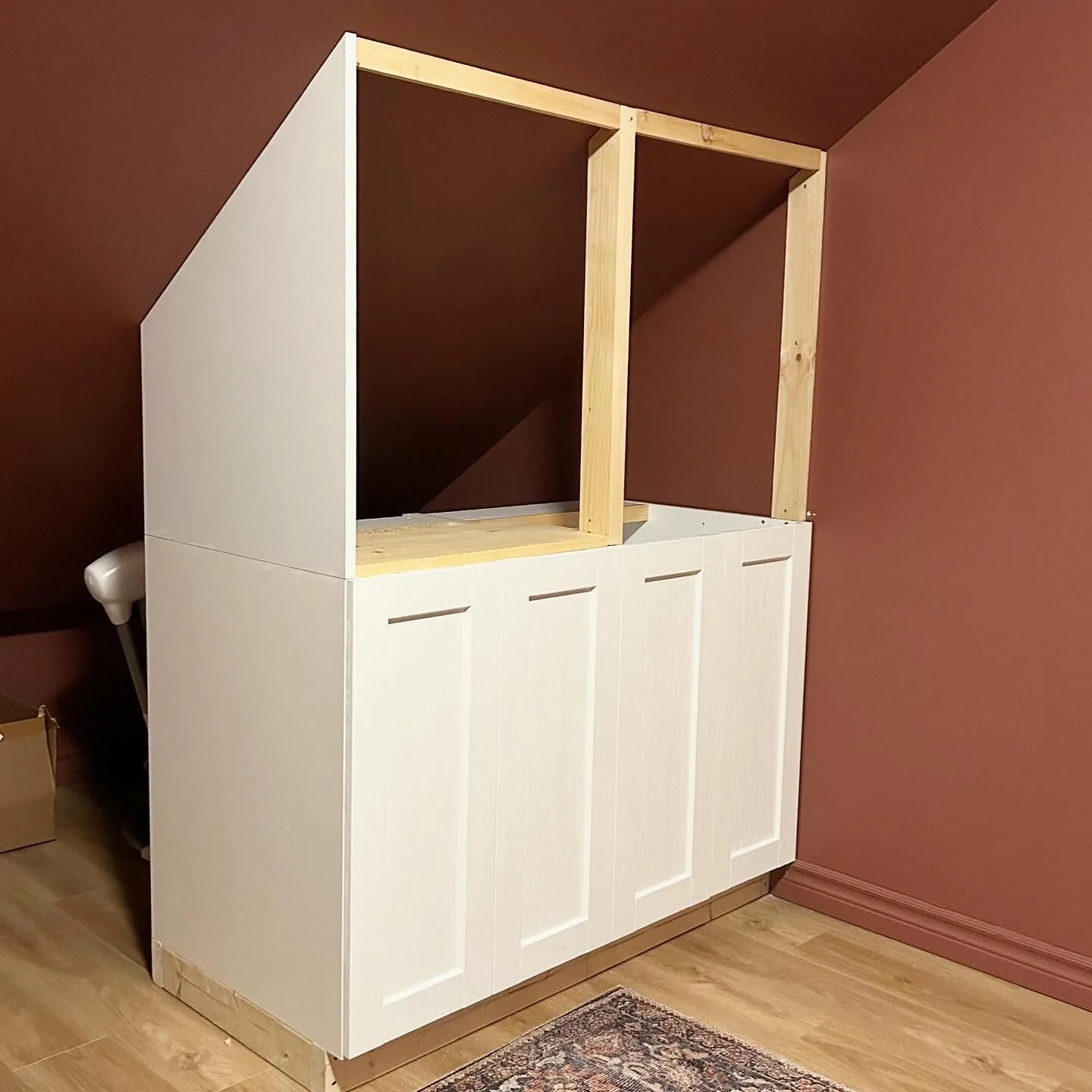 oneroomchallenge-cathybalsom-nursery-buit-in-storage-base-and-doors.jpg