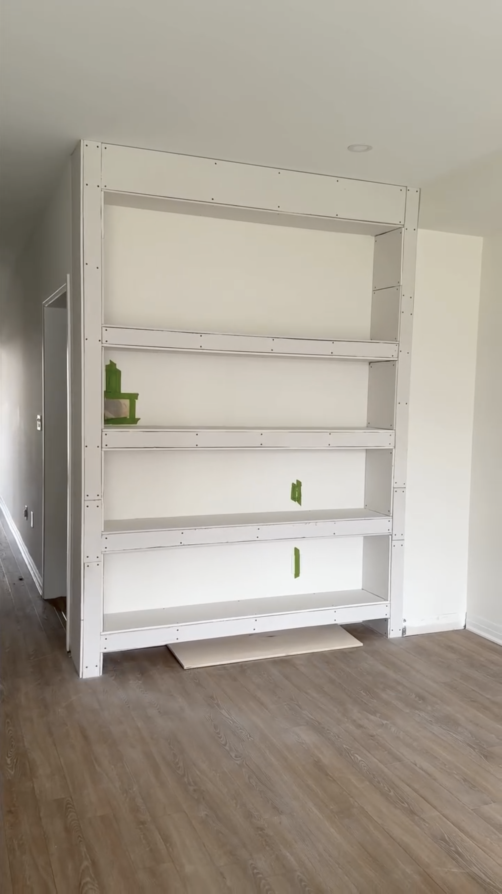 carolpham-before-after-DIY-built-in-shelves-drywall-1.png