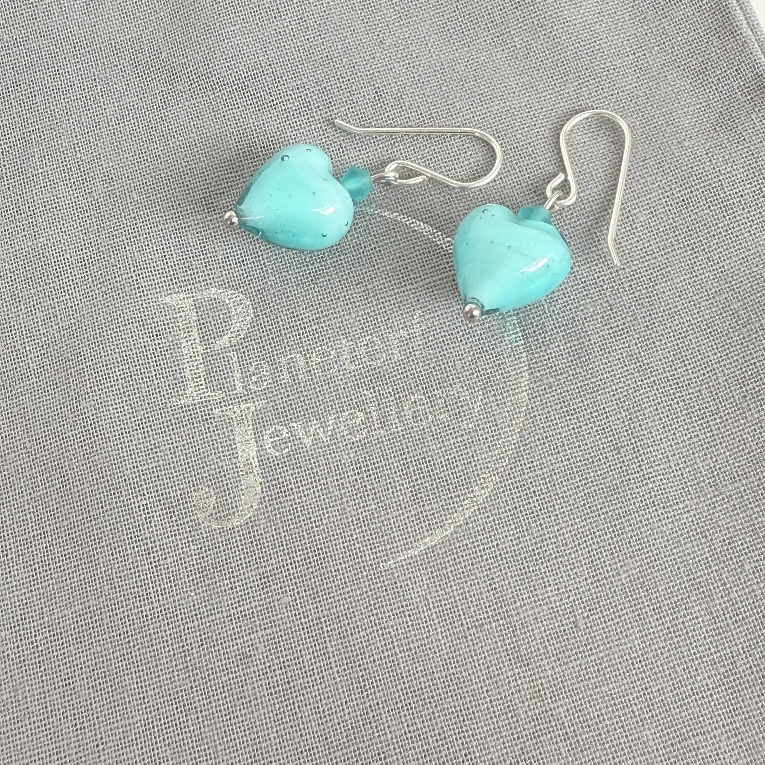 Blue Murano hearts on sterling silver earwires