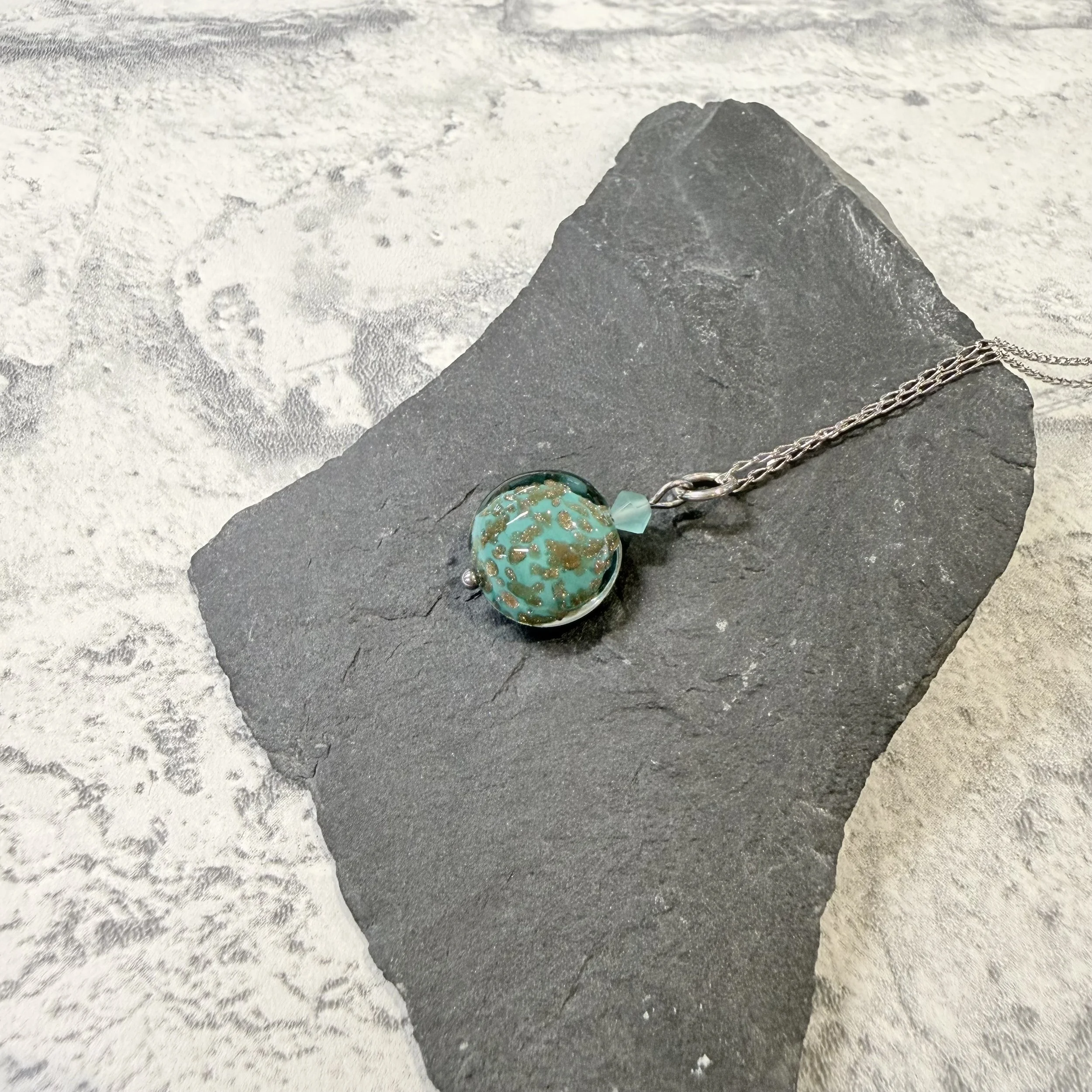 Green Murano round on sterling silver chain