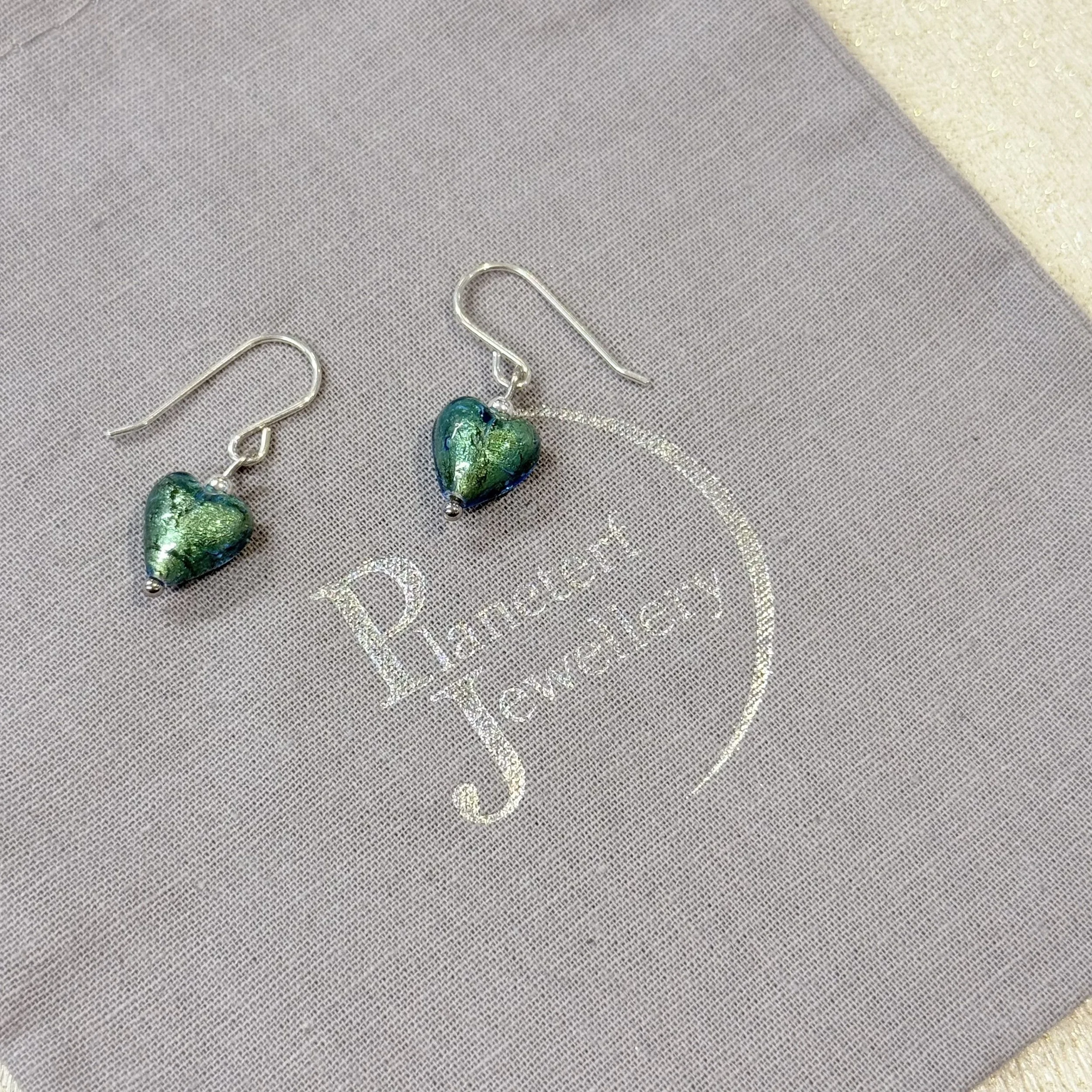 Green Murano heart earrings on sterling silver earwires
