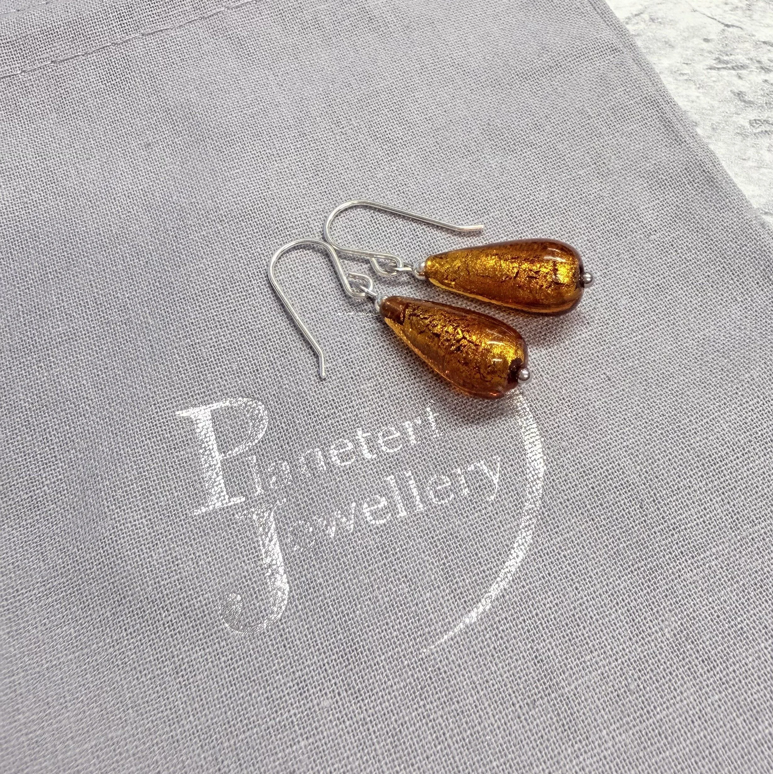Amber-orange Murano teardrops on sterling silver earwires